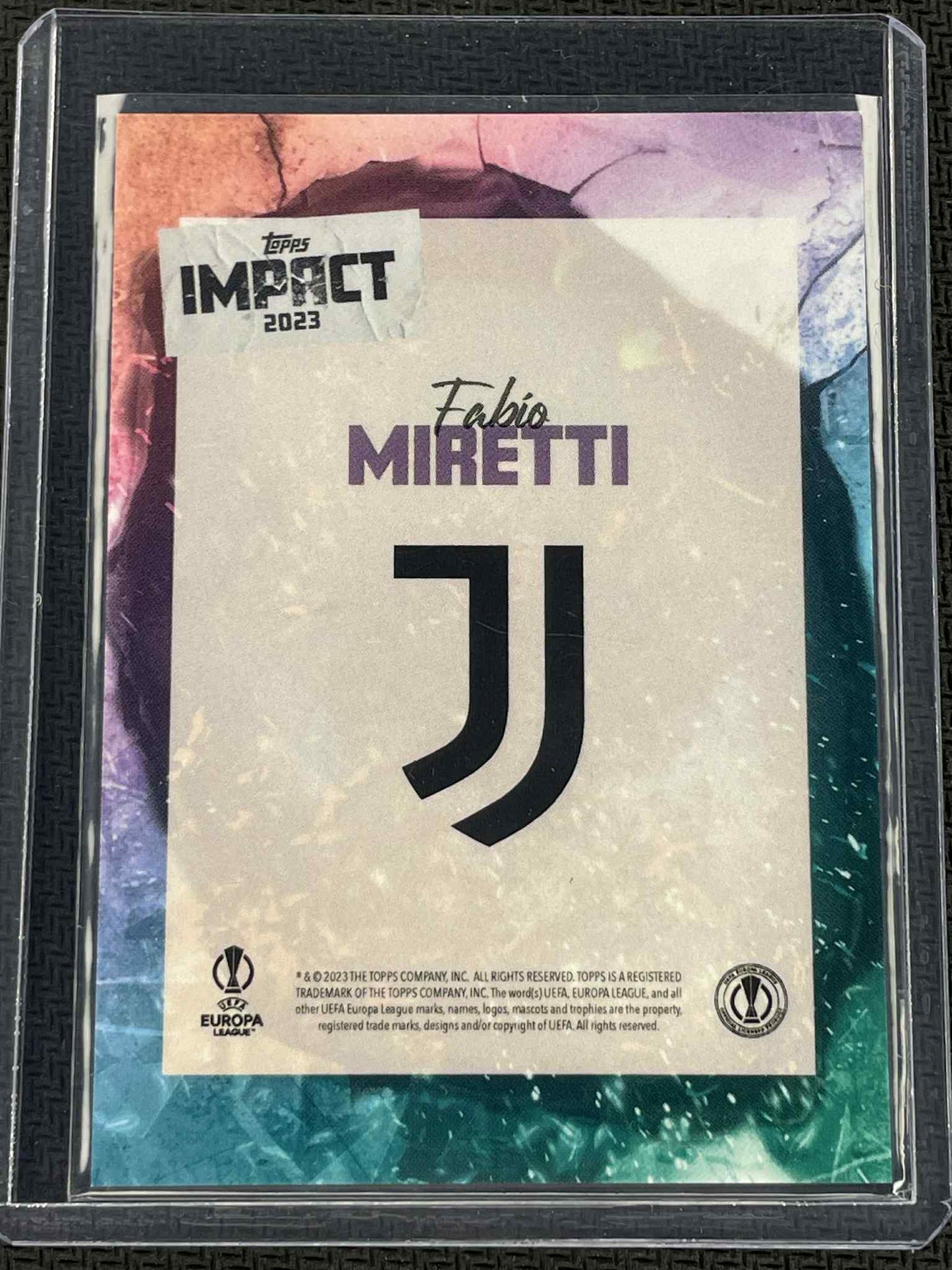 Trading card of Fabio Miretti with Juventus logo, framed by a colorful border.