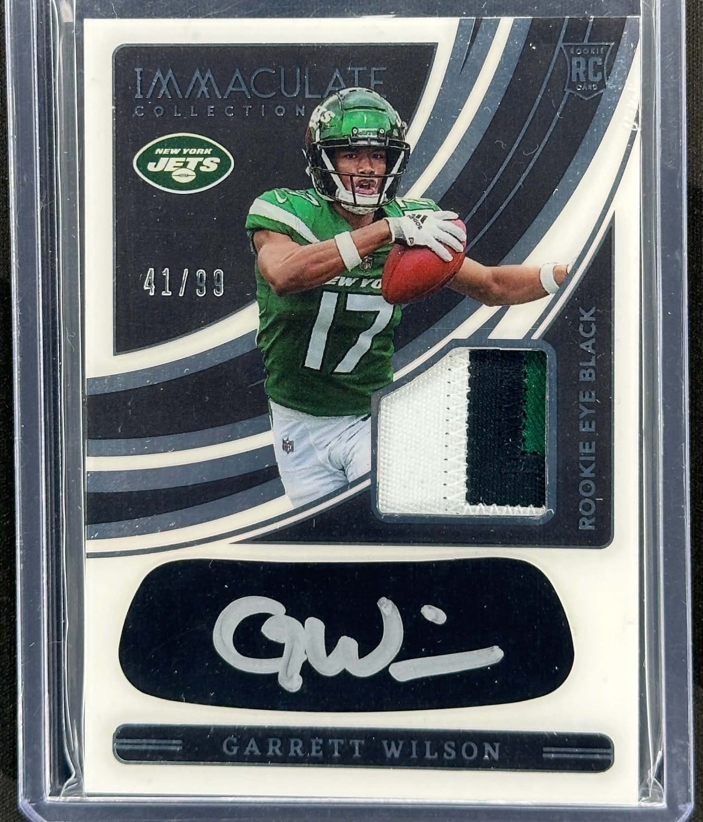 Garrett Wilson 2022 Panini Immaculate Eye Black Rookie Patch Auto numbered to 99 New York Jets football card
