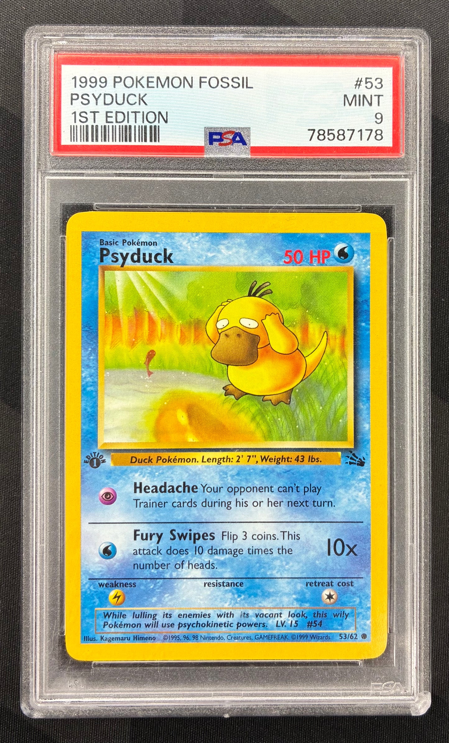 1999 Pokémon Psyduck 53/62 Fossil 1st Edition PSA 9