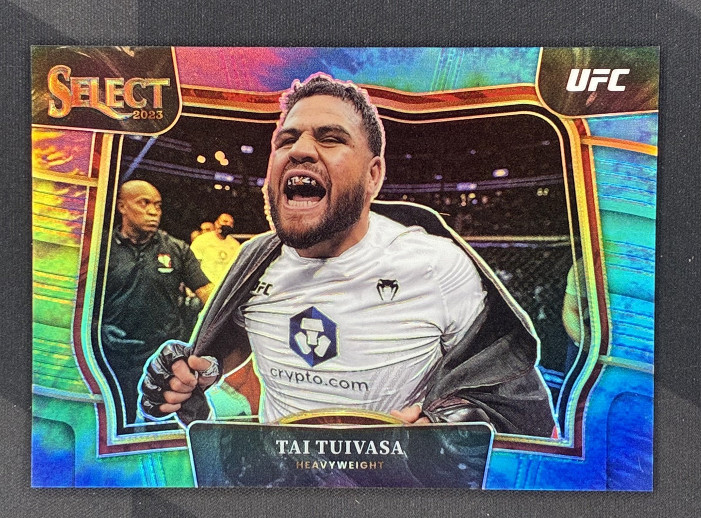 2023 Panini Select UFC Tai Tuivasa #257 Tie-Dye Prizm card serial numbered 08 of 25.