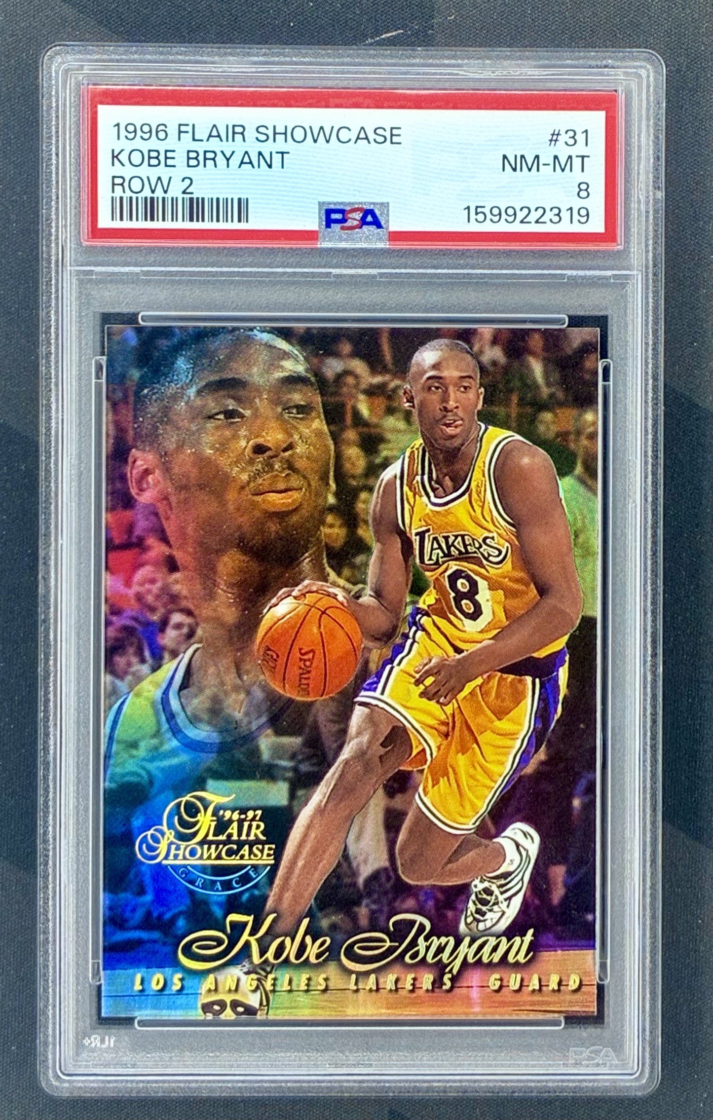 1996-97 Flair Showcase Kobe Bryant Row 1 Rookie Card #31 graded PSA 8 with PSA Row 2 label error.