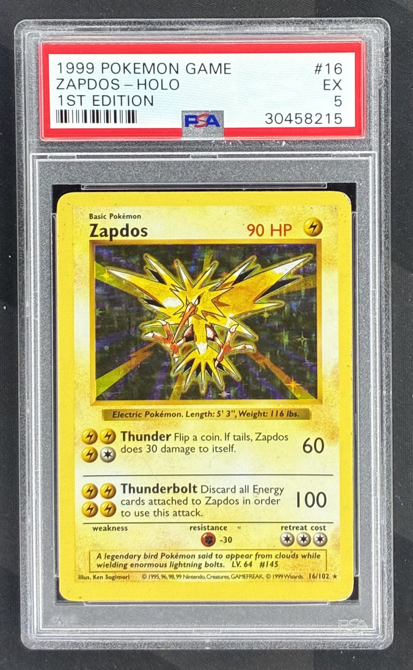 1999 Pokémon Shadowless Zapdos 16/102 Holo card graded PSA 5 with PSA label error incorrectly identifying it as 1st Edition.