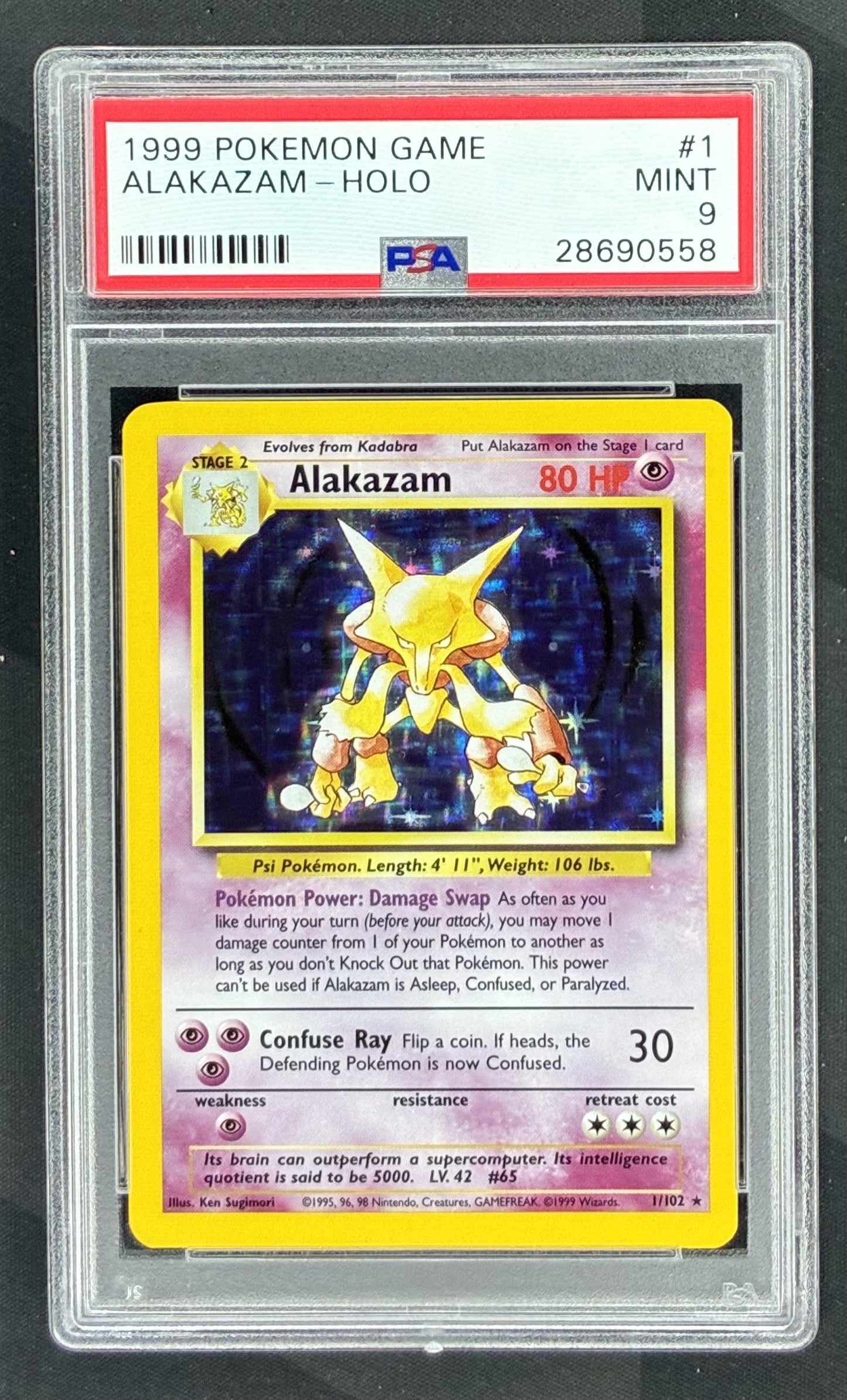 1999 Pokémon Base Set Alakazam Holo 1/102 card graded PSA 9 Mint by PSA.