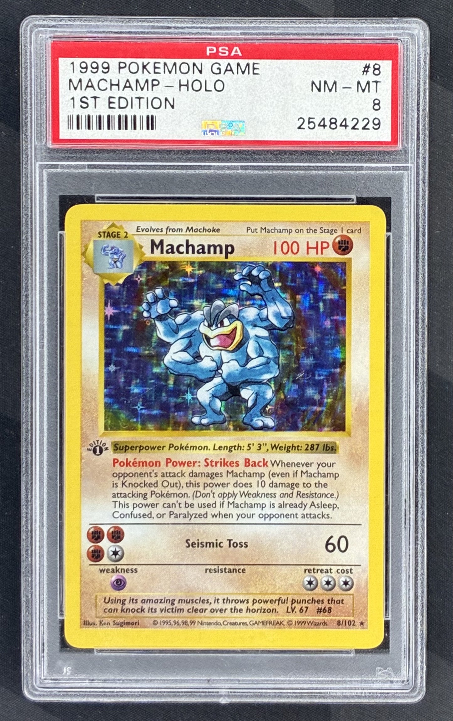 1999 Pokémon Base Set 1st Edition Machamp Holo Rare 8/102 Wizards of the Coast card graded PSA 8 Near Mint-Mint.