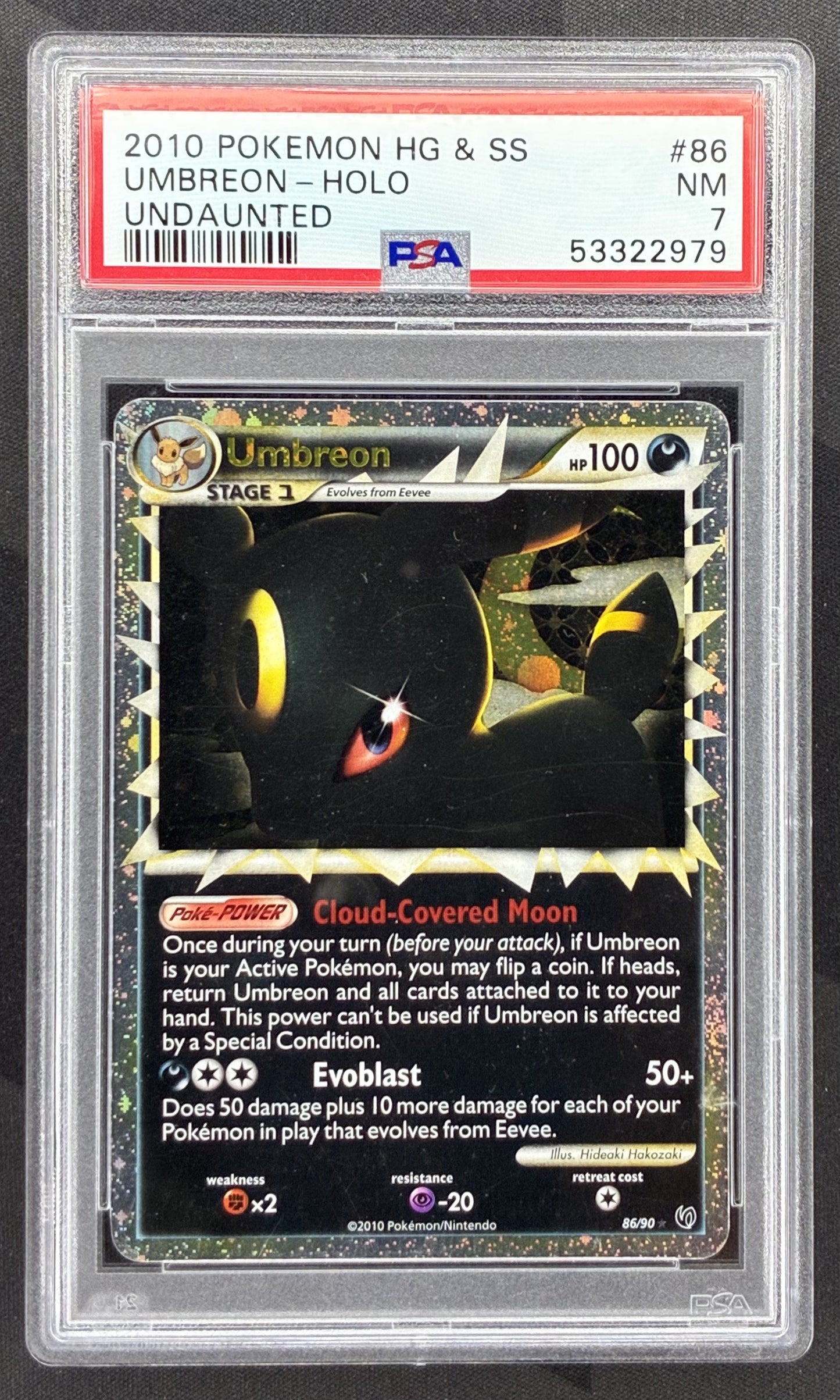 2010 Pokémon HeartGold & SoulSilver Undaunted Umbreon Prime Holo 86/90 card graded PSA 7 NM.