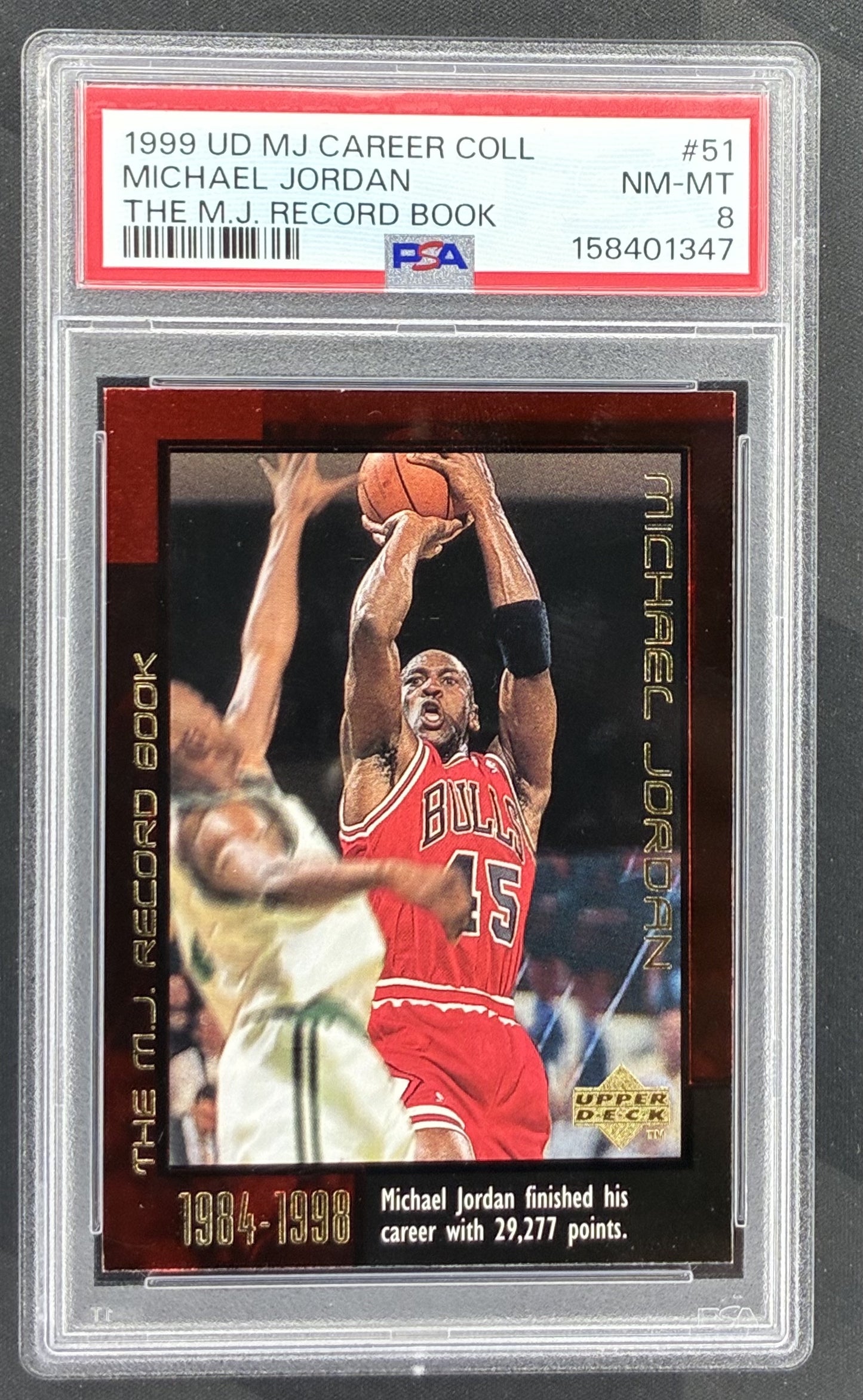 1999 Upper Deck Michael Jordan Career Collection M.J. Record Book #51 graded PSA 8 Near Mint-Mint.