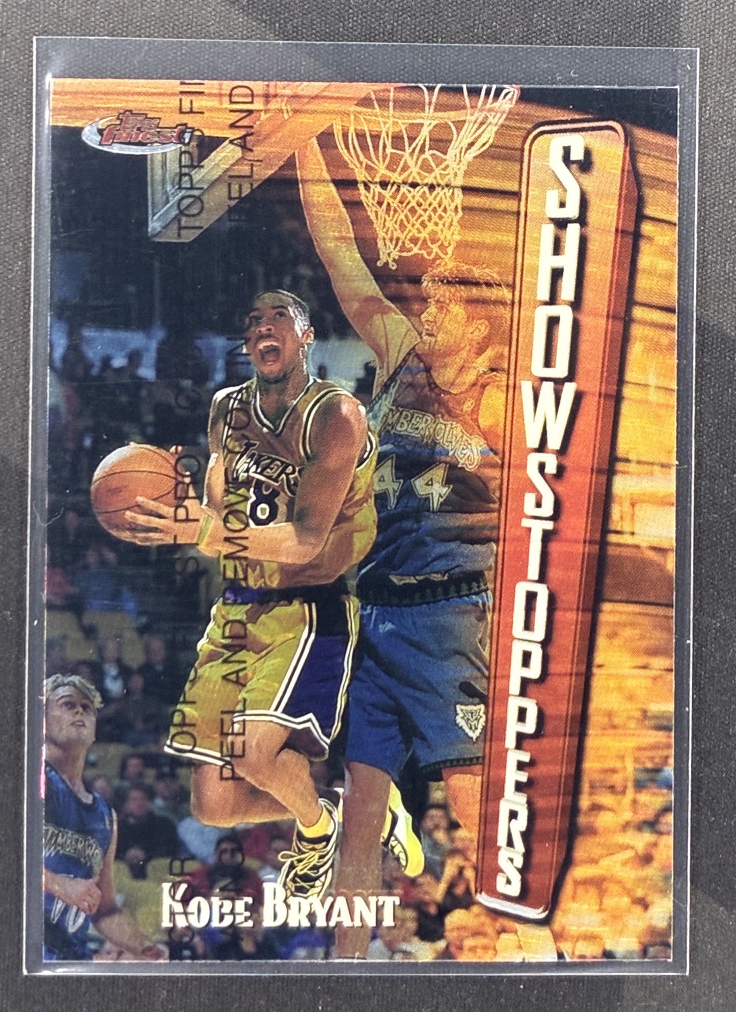 1997-98 Topps Finest Kobe Bryant Showstoppers #262 S22 Los Angeles Lakers basketball card with original protective coating.