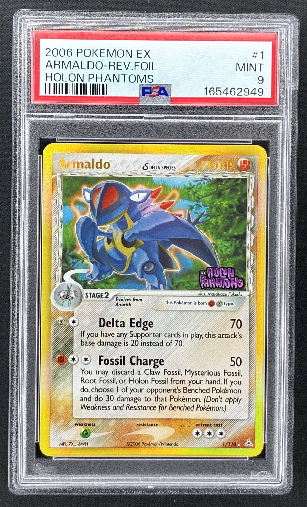 2006 Pokémon EX Holon Phantoms Armaldo Delta Species #1/110 stamped Reverse Holo PSA 9 Mint card.