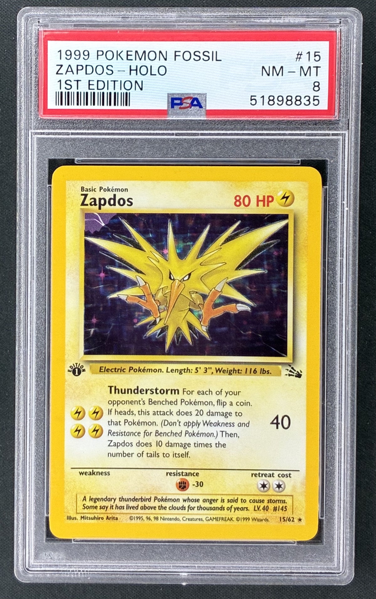 1999 Pokémon Fossil Zapdos 15/62 1st Edition Holo Rare PSA 8 NM-MT graded card.