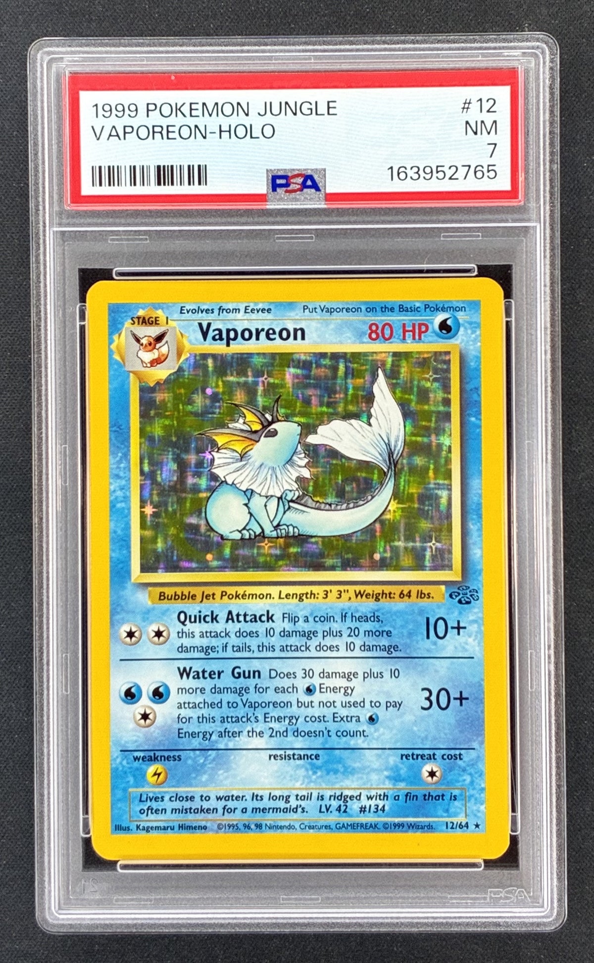 1999 Pokémon Jungle Vaporeon #12/64 Unlimited Holo Rare WOTC card, professionally authenticated and graded PSA 7 Near Mint.