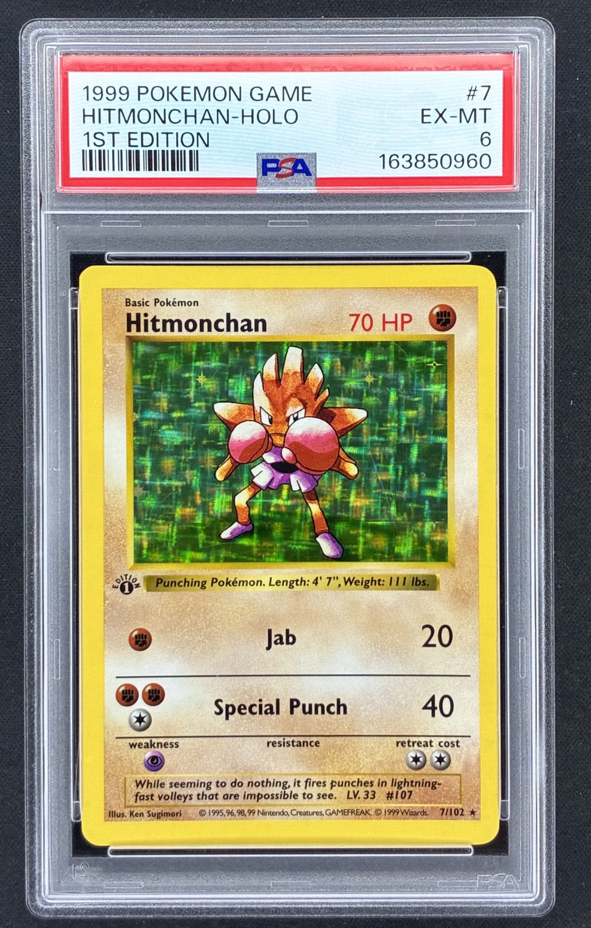1999 Pokémon Base Set 1st Edition Shadowless Hitmonchan 7/102 holographic card illustrated by Ken Sugimori, professionally graded PSA 6 EX-MT.