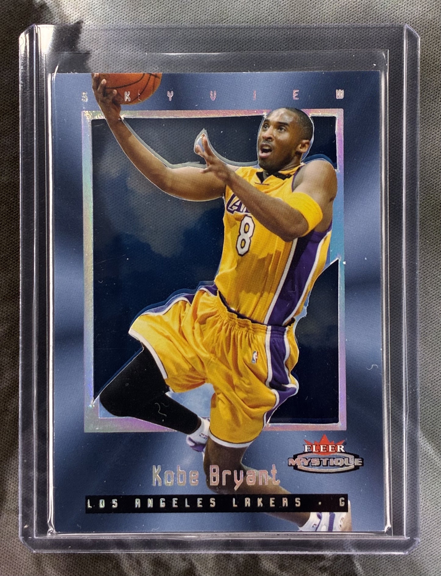 2003-04 Fleer Mystique Kobe Bryant Skyview Insert /100 – Lakers