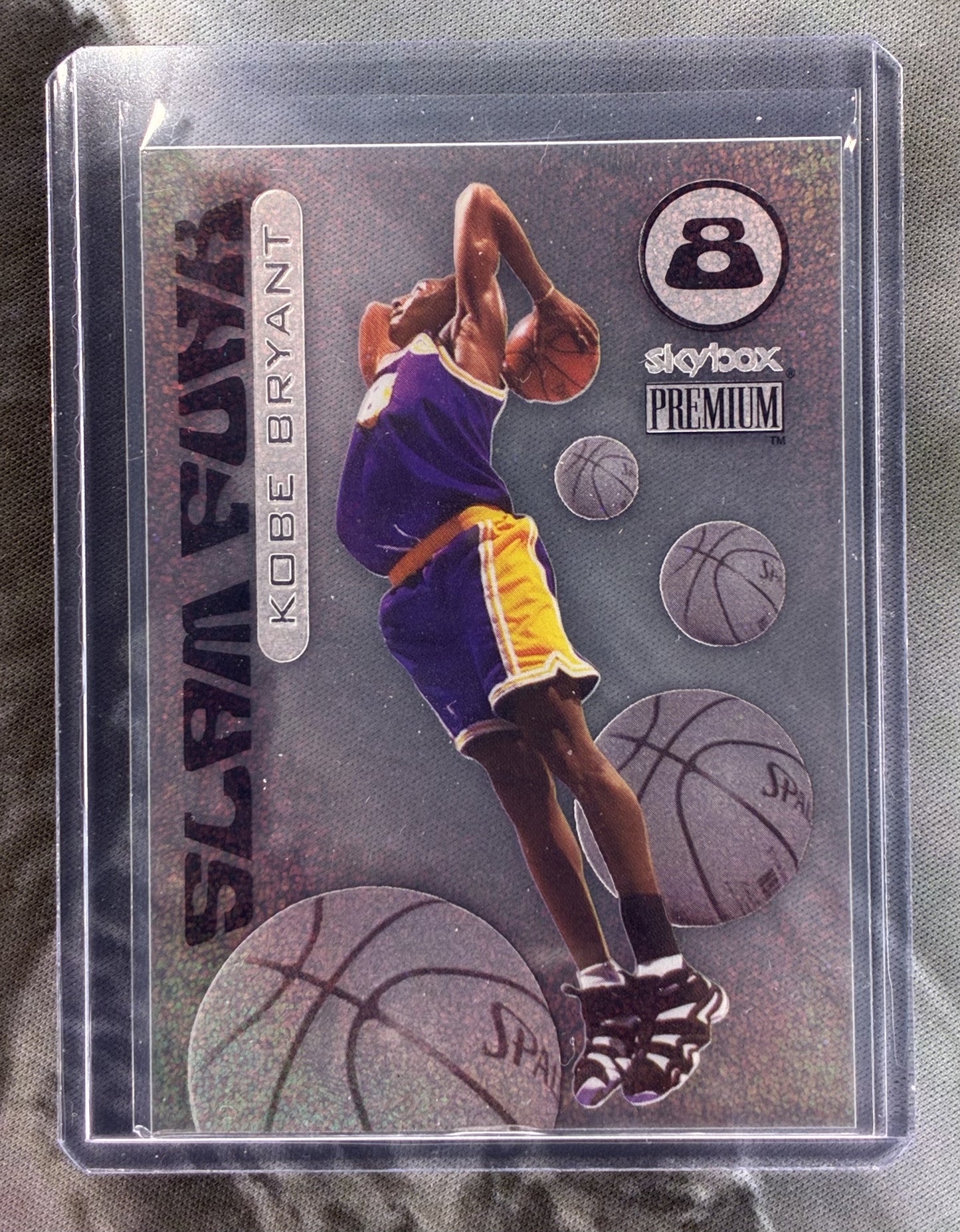 1998-99 SkyBox Slam Funk Kobe Bryant Acetate SSP Refractor Insert – Lakers