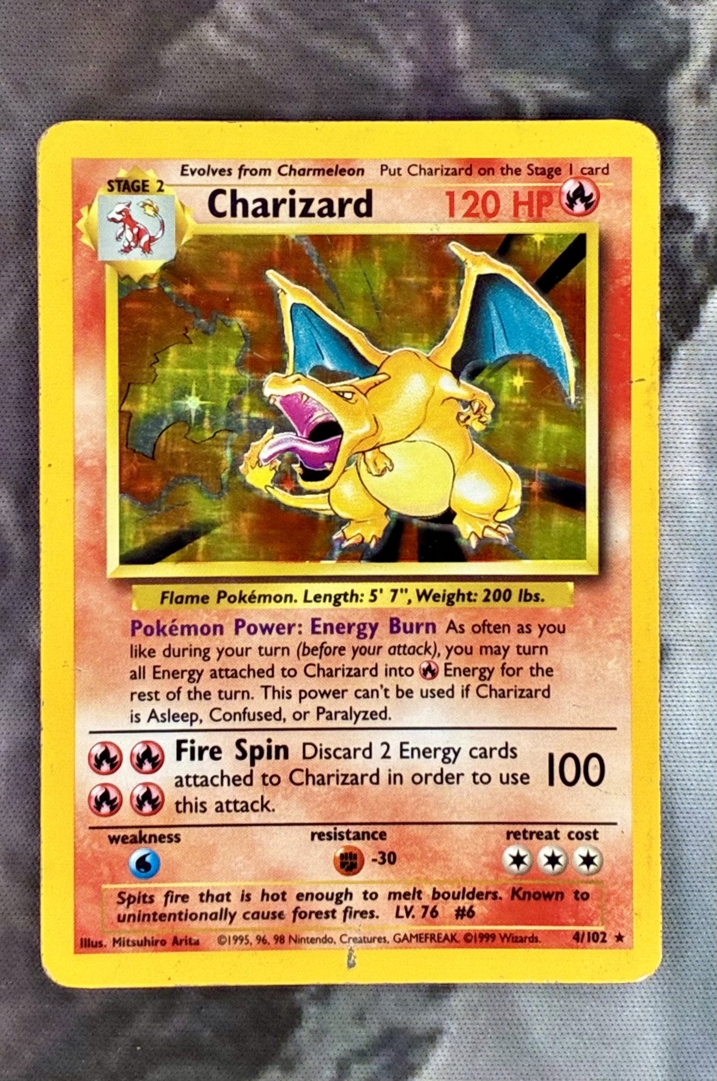 Charizard 4/102 Base Set Unlimited Holo Pokémon Card – Heavily Played (HP)