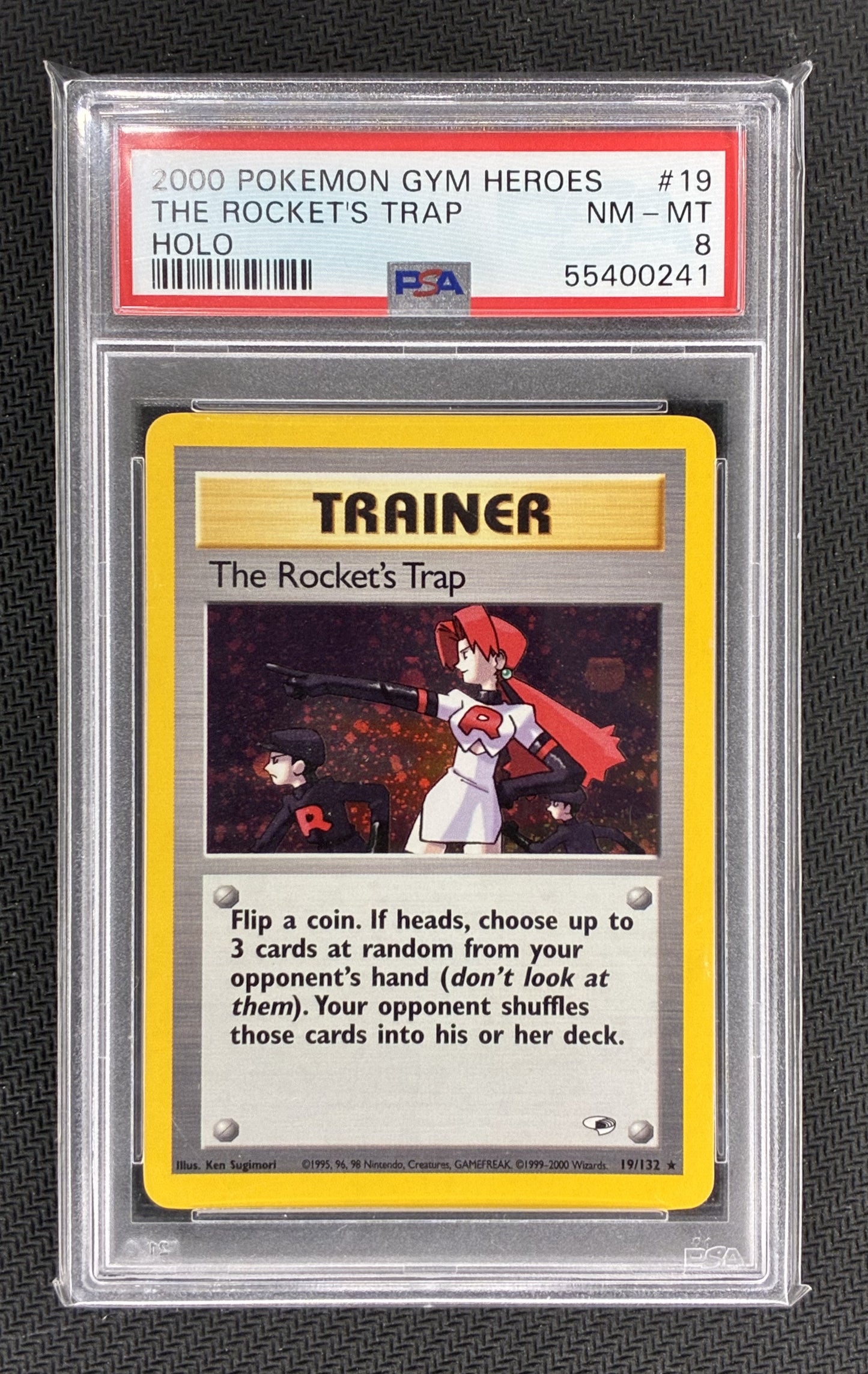 The Rocket’s Trap Holo – 19/132 – Pokémon Gym Heroes PSA 8 Slabbed Trainer Card