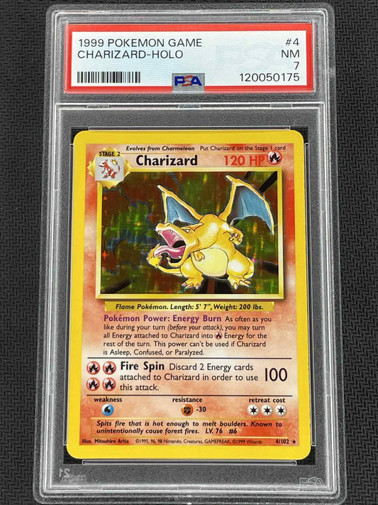 Pokémon Charizard trading card in a protective case with PSA grading label