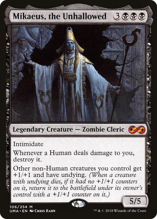 A Magic: The Gathering trading card for 'Mikaeus, the Unhallowed' from the UMA - En expansion. The card features a dark fantasy illustration of a skeletal cleric in white robes, with a dark gray border and black text.