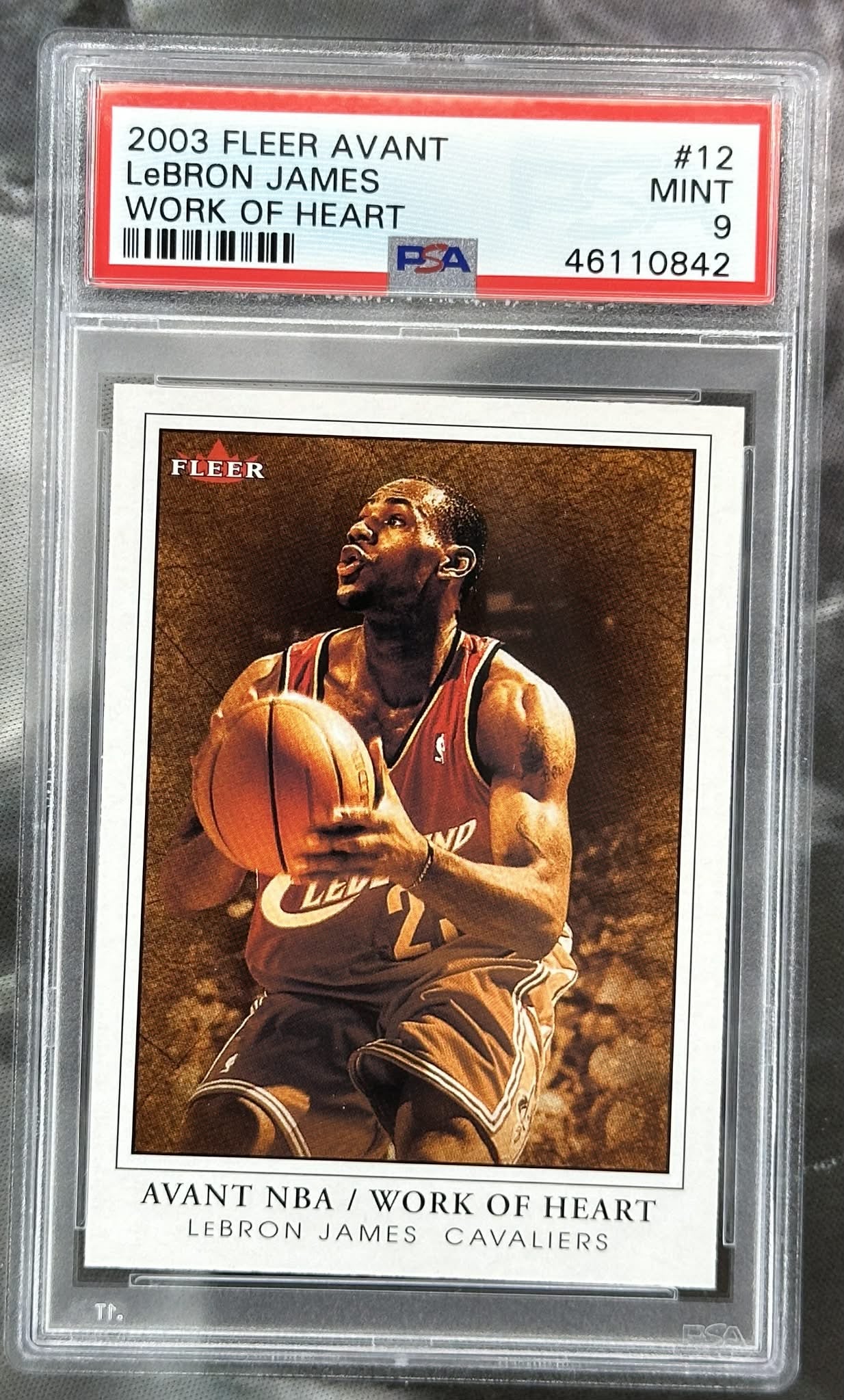 2003 Fleer Avant Work of Heart LeBron James rookie #12 serial numbered 260/299 PSA 9 Mint graded basketball card