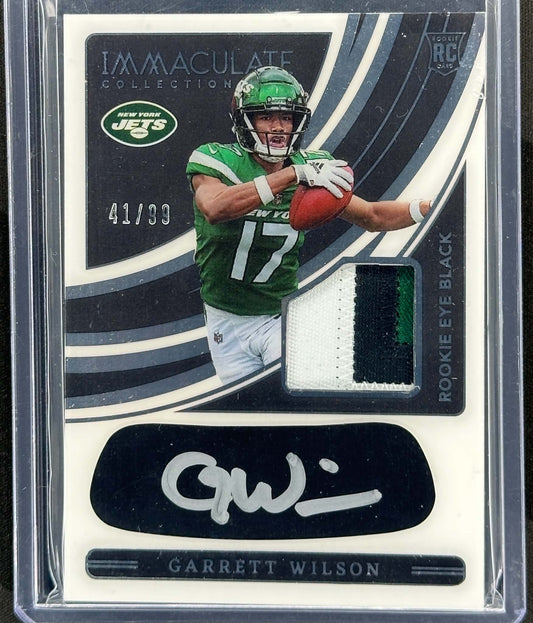 Garrett Wilson 2022 Panini Immaculate Eye Black Rookie Patch Auto numbered to 99 New York Jets football card