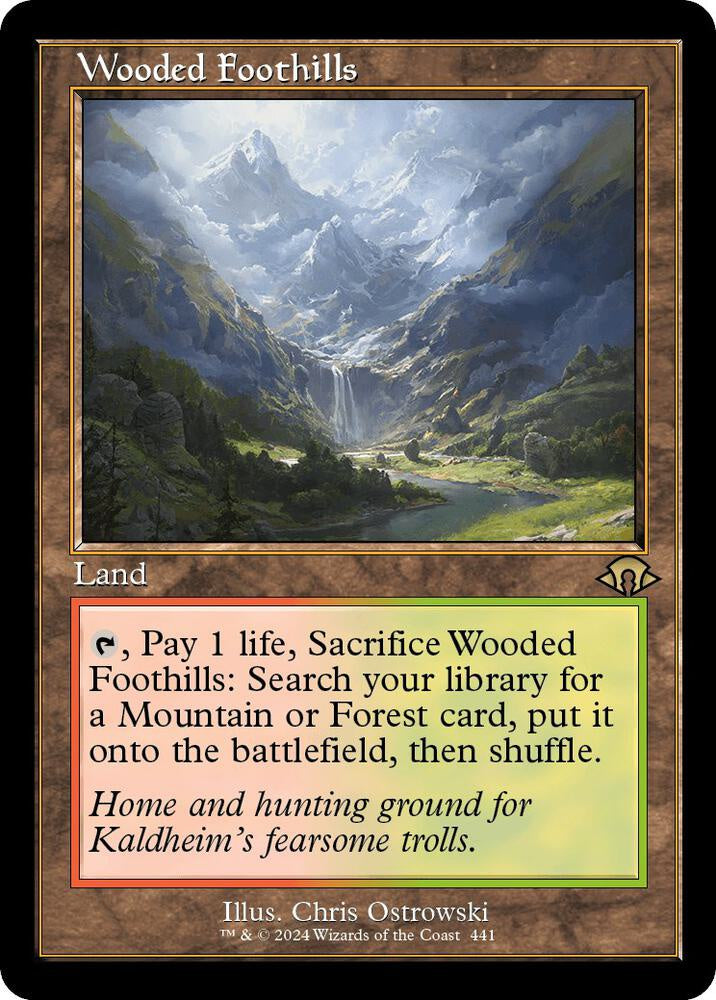 Wooded Foothills Retro Frame from Modern Horizons 3 (MH3) Near Mint Rare Magic: The Gathering fetch land featuring classic old-border styling.