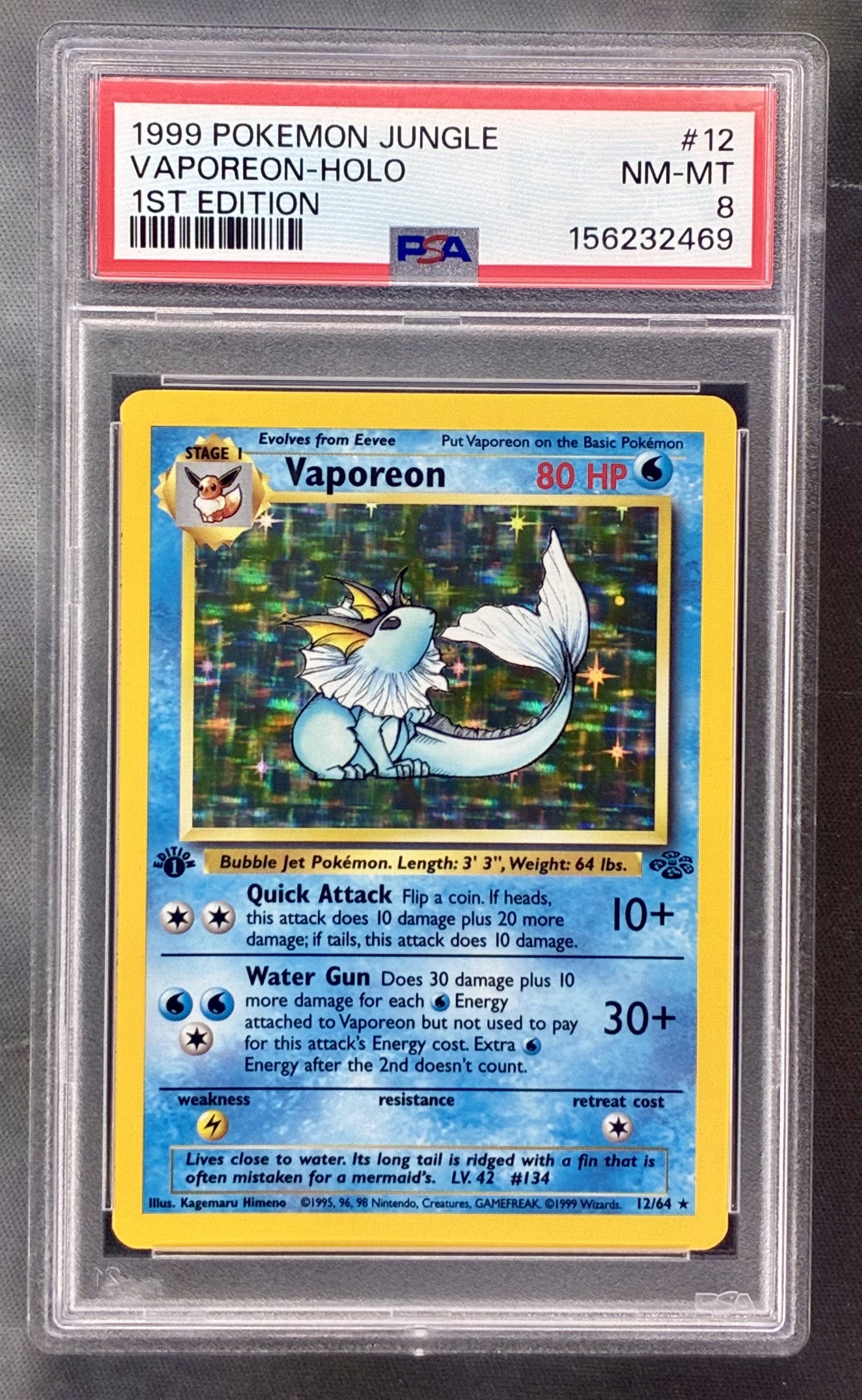 Vaporeon 12/64 Jungle 1st Edition PSA 8 holo Pokemon card