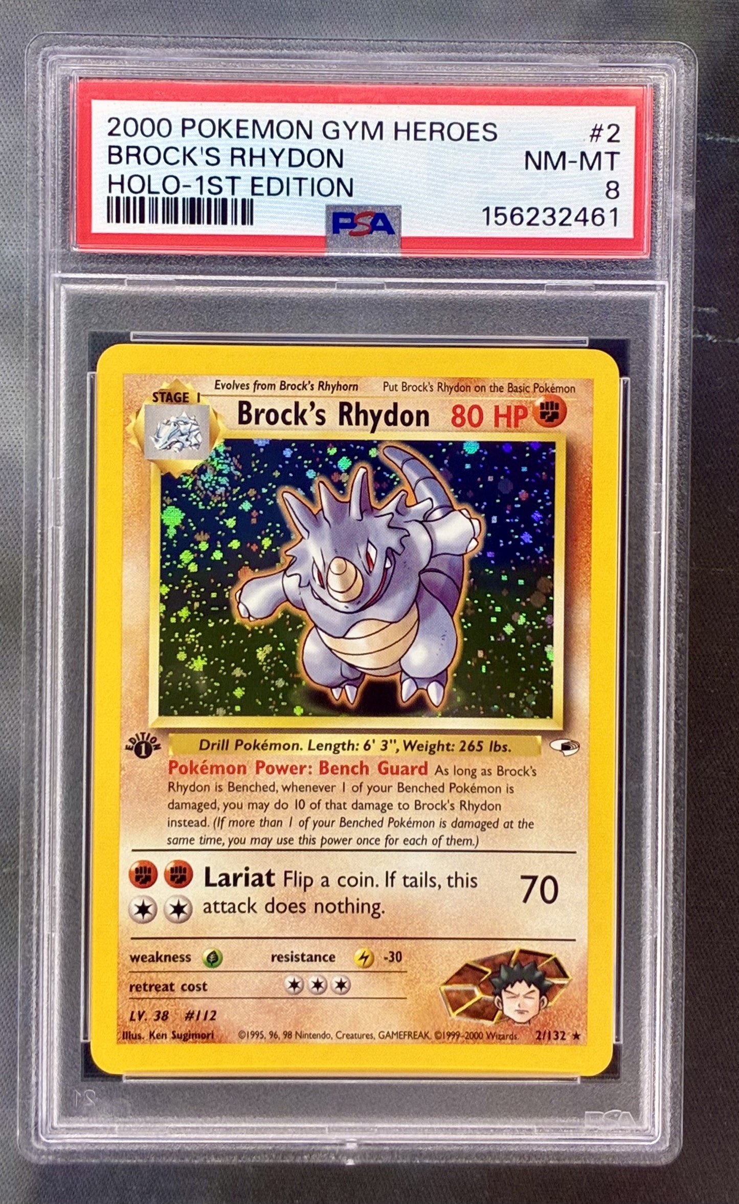 Brock’s Rhydon 2/132 1st Edition PSA 8 swirl holo Pokemon card