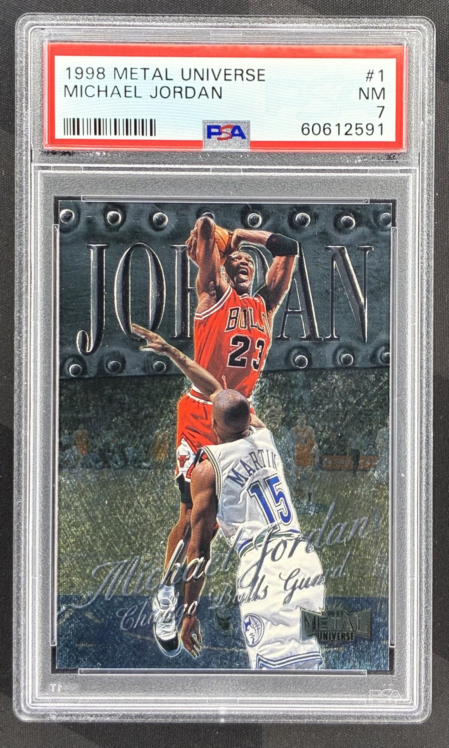 1998-99 Metal Universe Michael Jordan #1 PSA 7 NM Chicago Bulls basketball card Fleer SkyBox 1990s NBA collectible.