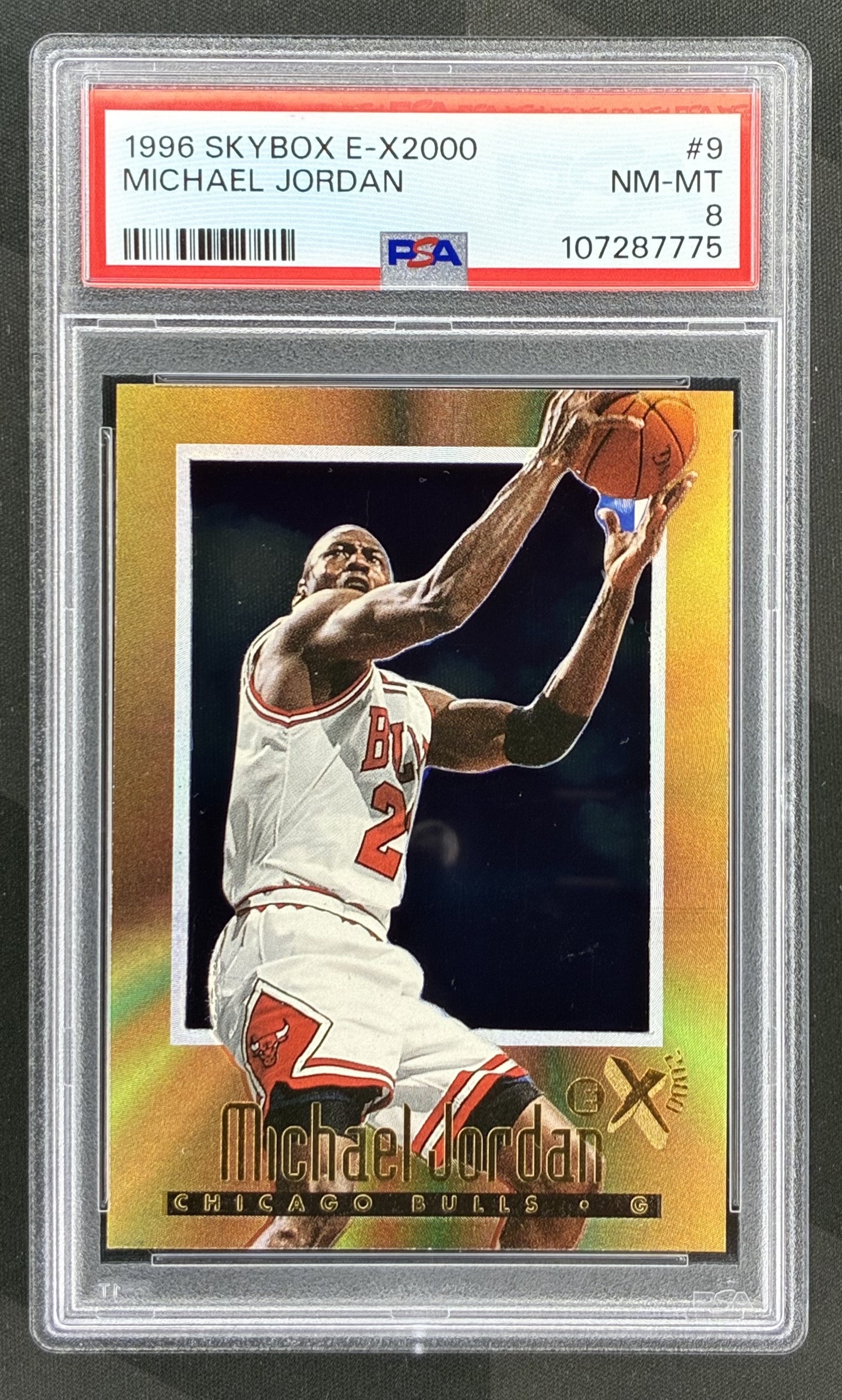 1996 SkyBox E-X2000 Michael Jordan #9 PSA 8 NM-MT Chicago Bulls basketball card Hall of Fame NBA collectible from the 1990s.
