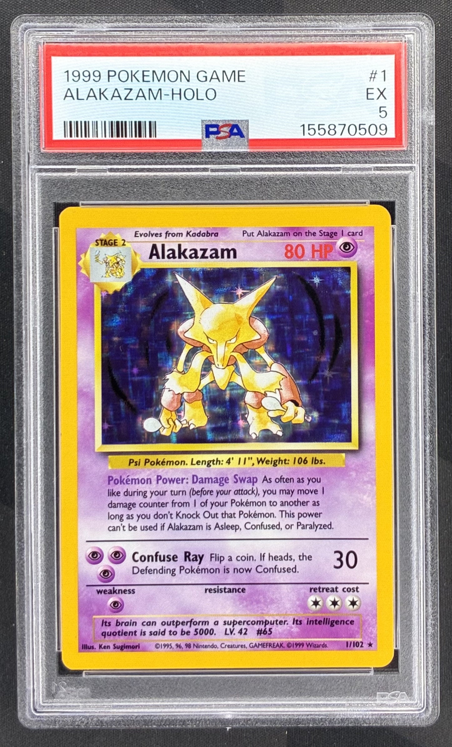 1999 Pokémon Alakazam 1/102 Base Set Holo Rare PSA 5 EX graded English Wizards of the Coast trading card.