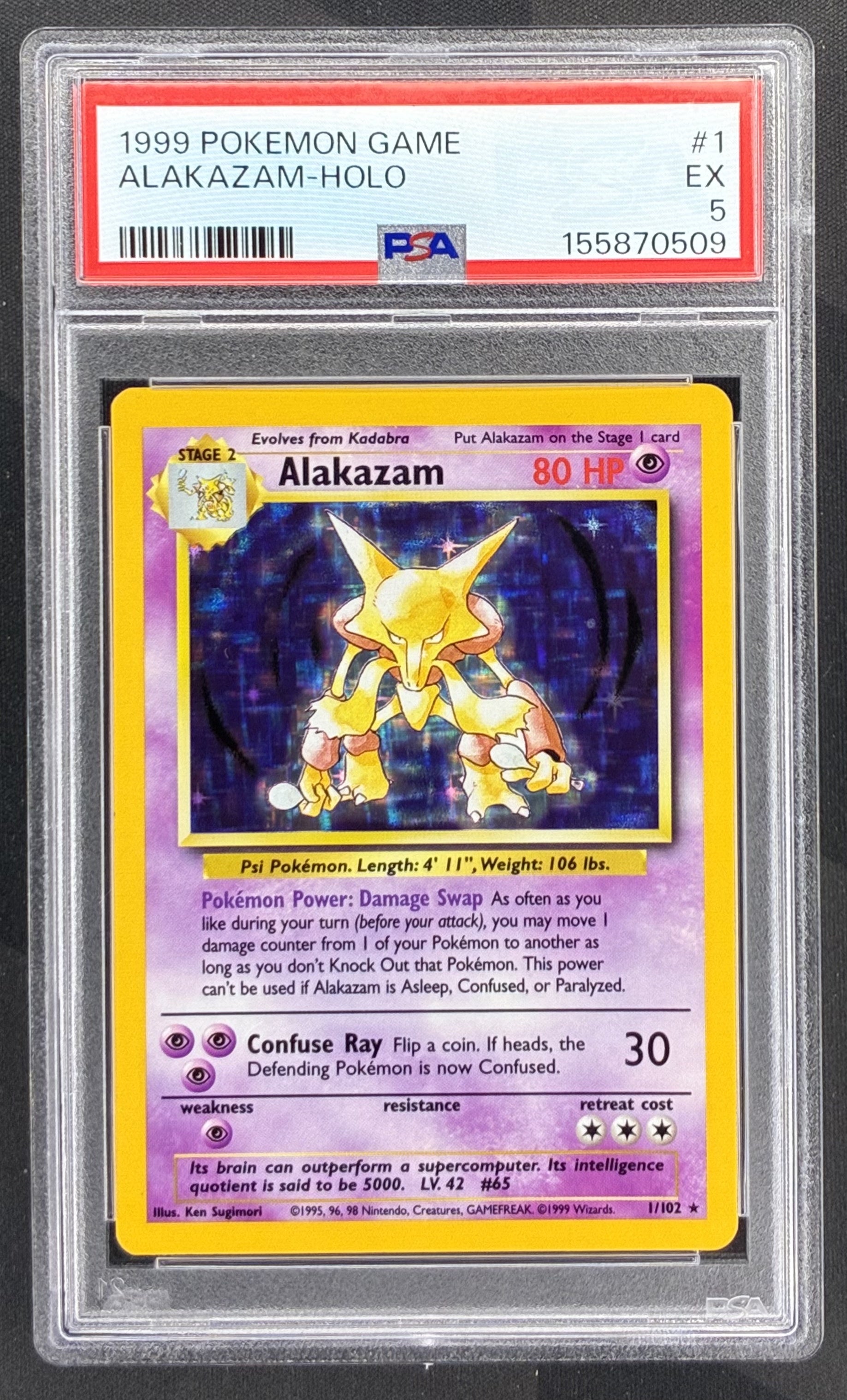 1999 Pokémon Alakazam 1/102 Base Set Holo Rare PSA 5 EX graded English Wizards of the Coast trading card.