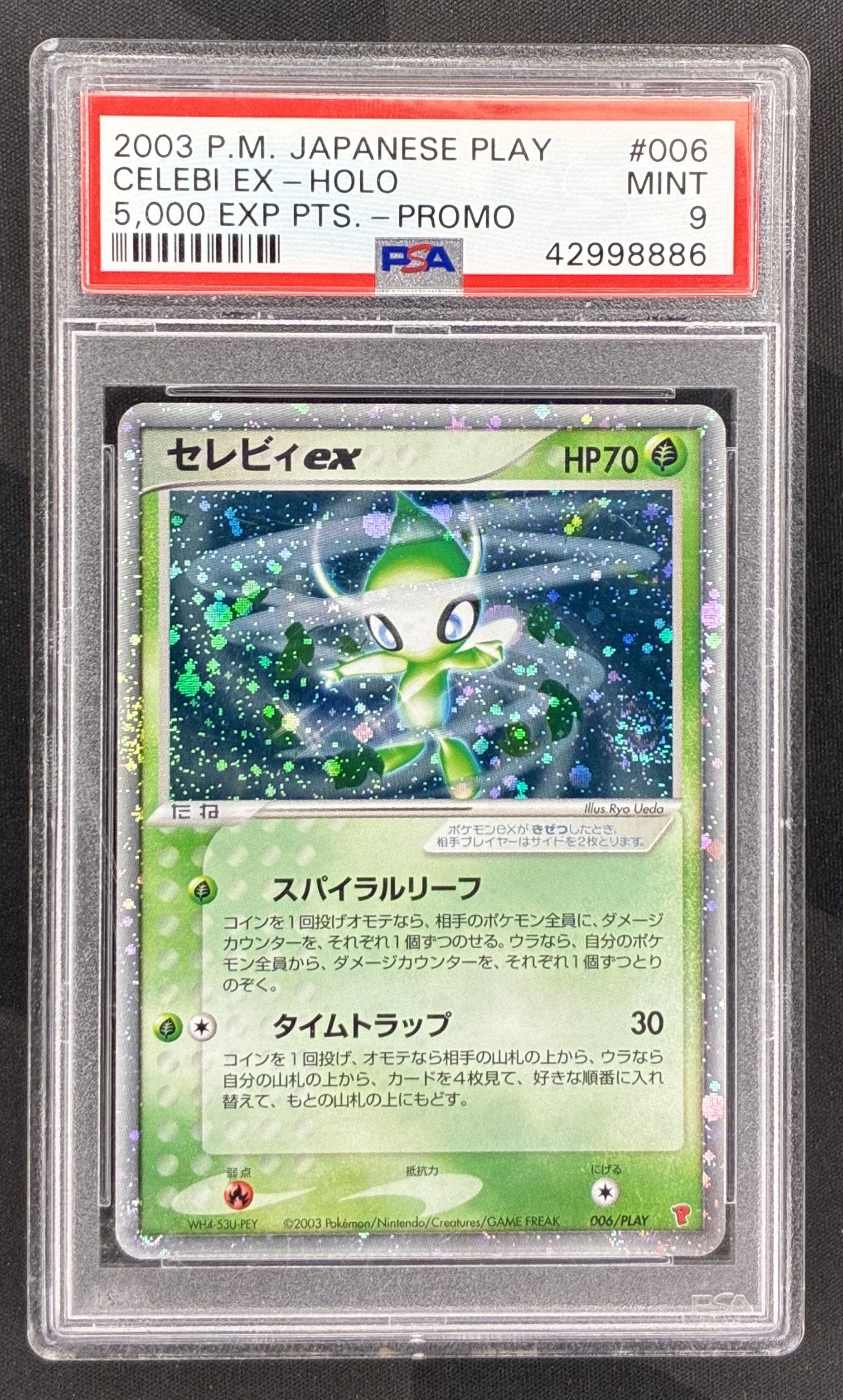 2003 Japanese Pokémon Celebi ex 006/PLAY 5,000 EXP Points Promo holo card with swirl professionally graded PSA 9 Mint.
