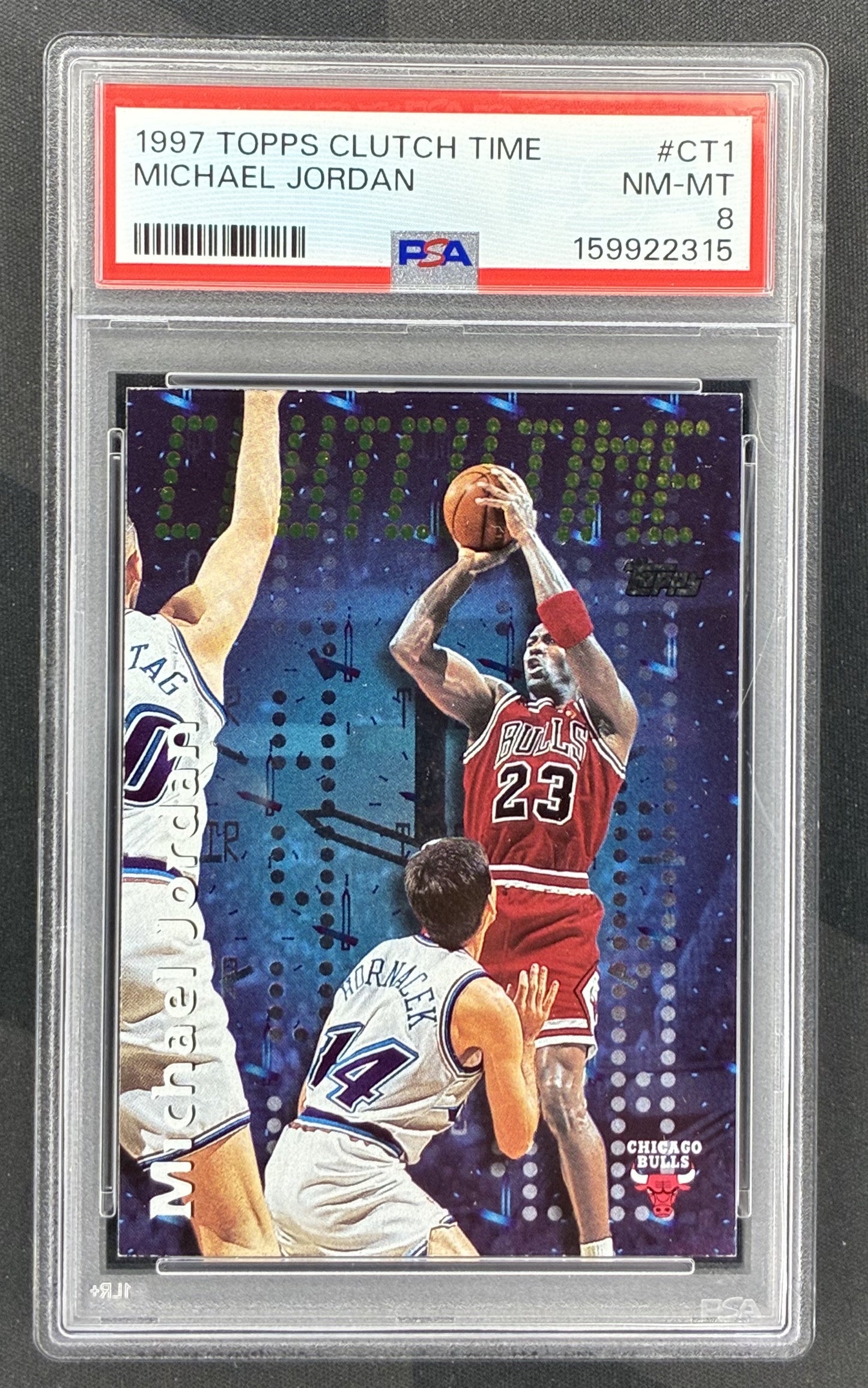 1997 Topps Clutch Time CT1 Michael Jordan basketball card professionally graded PSA 8 NM-MT.