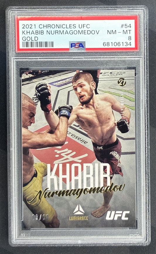 2021 Panini Chronicles UFC Luminance Khabib Nurmagomedov Gold /10 #54 trading card graded PSA 8 Near Mint-Mint.