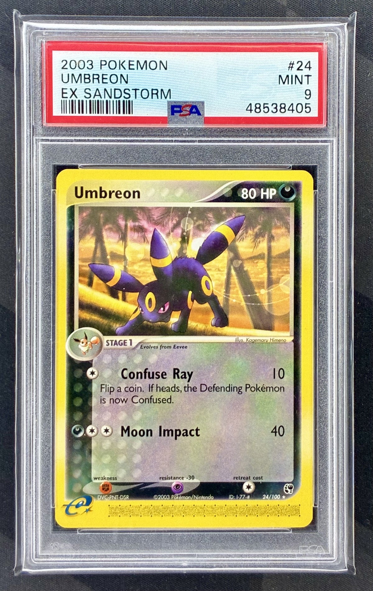 2003 Pokémon EX Sandstorm Umbreon 24/100 trading card graded PSA 9 Mint.