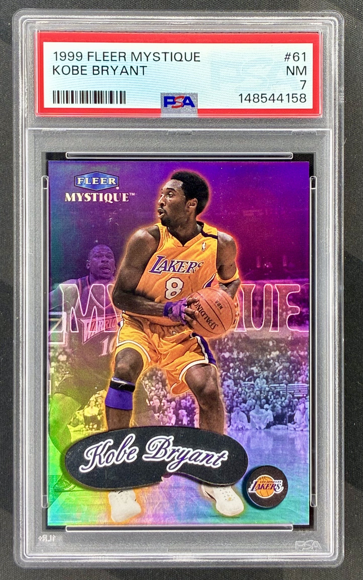 1999-00 Fleer Mystique Kobe Bryant #5 Los Angeles Lakers basketball card graded PSA 7 Near Mint.