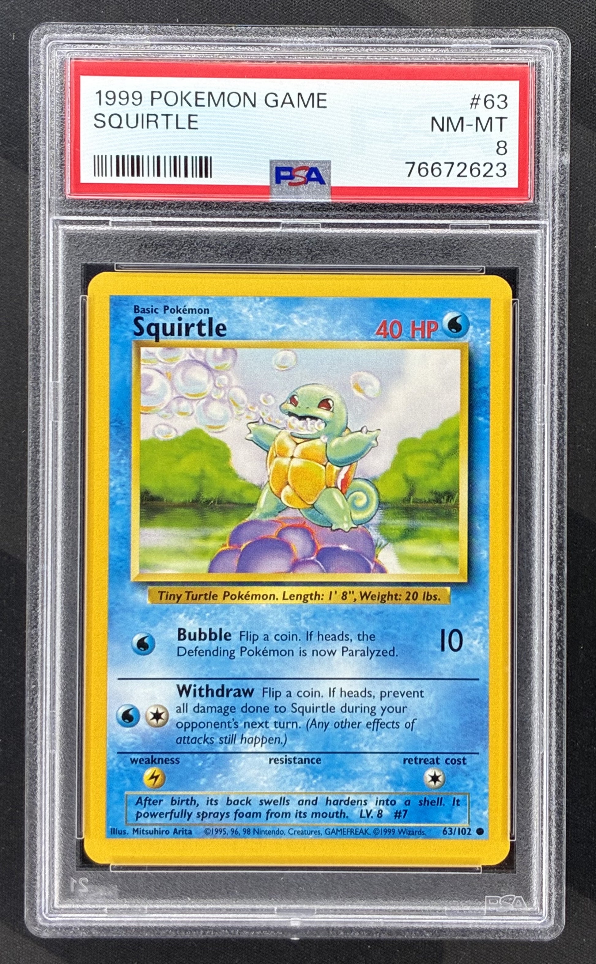 1999 Pokémon Base Set Squirtle 63/102 Unlimited card graded PSA 8 NM-MT.