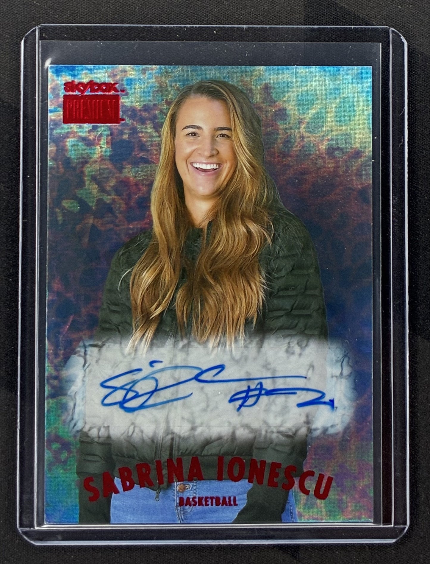 2021 SkyBox Metal Universe Champions Sabrina Ionescu Skybox Premium Gold Autograph S-44 basketball card.