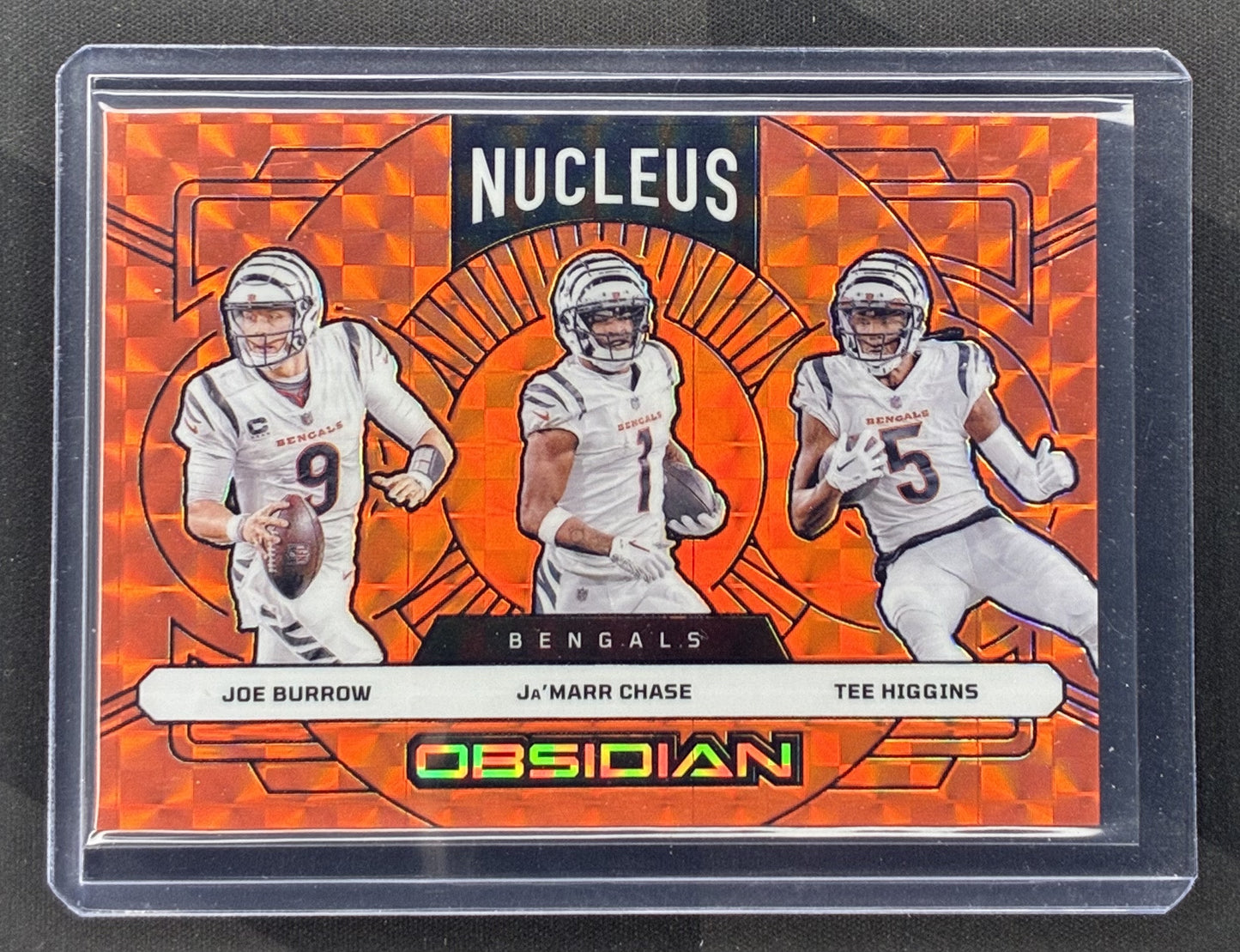 2024 Panini Obsidian Nucleus Joe Burrow Ja'Marr Chase Tee Higgins #20 Orange Mosaic Cincinnati Bengals card.