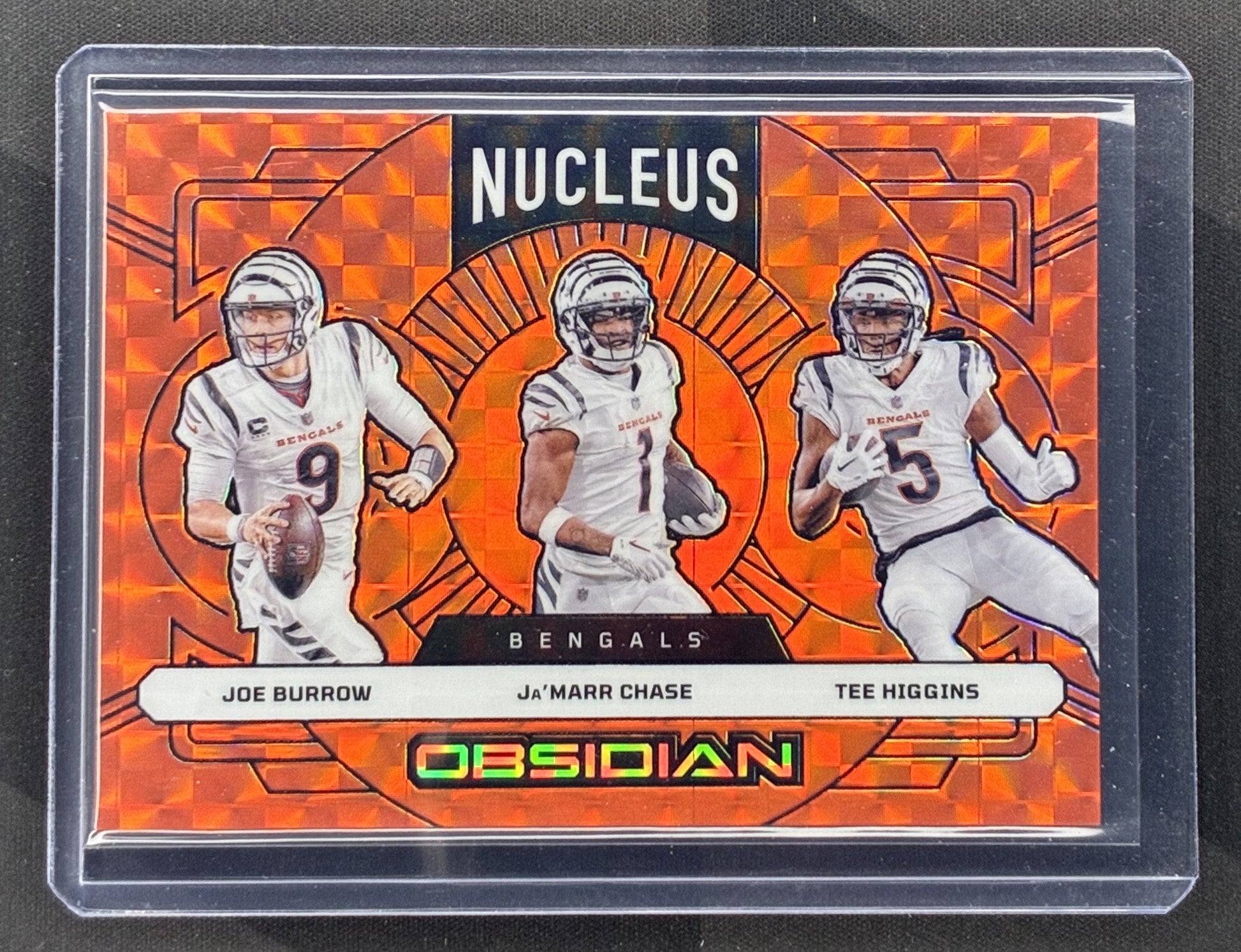 2024 Panini Obsidian Nucleus Joe Burrow Ja'Marr Chase Tee Higgins #20 Orange Mosaic Cincinnati Bengals card.