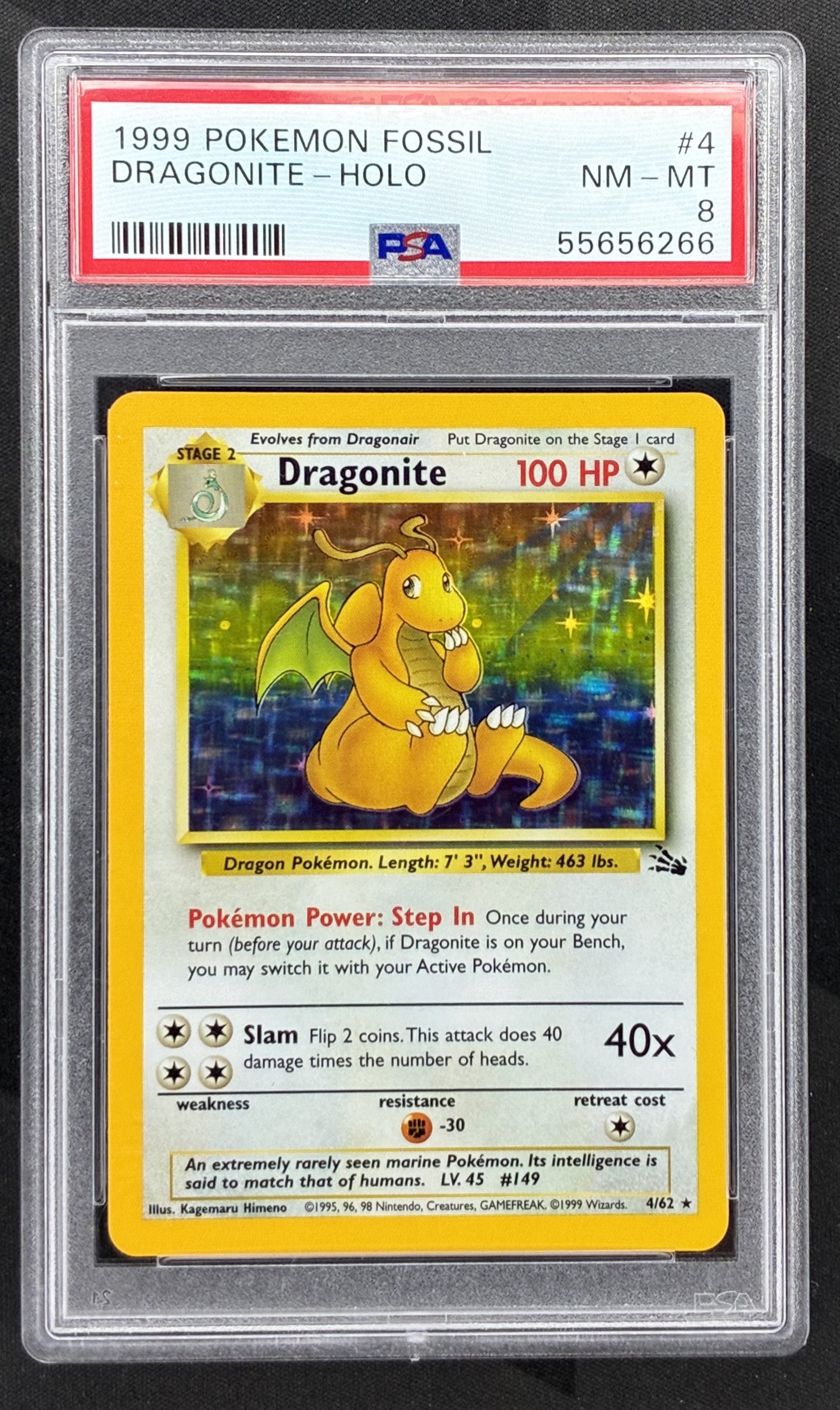 1999 Pokémon Fossil Dragonite Holo 4/62 English Wizards of the Coast card graded PSA 8 NM-MT.