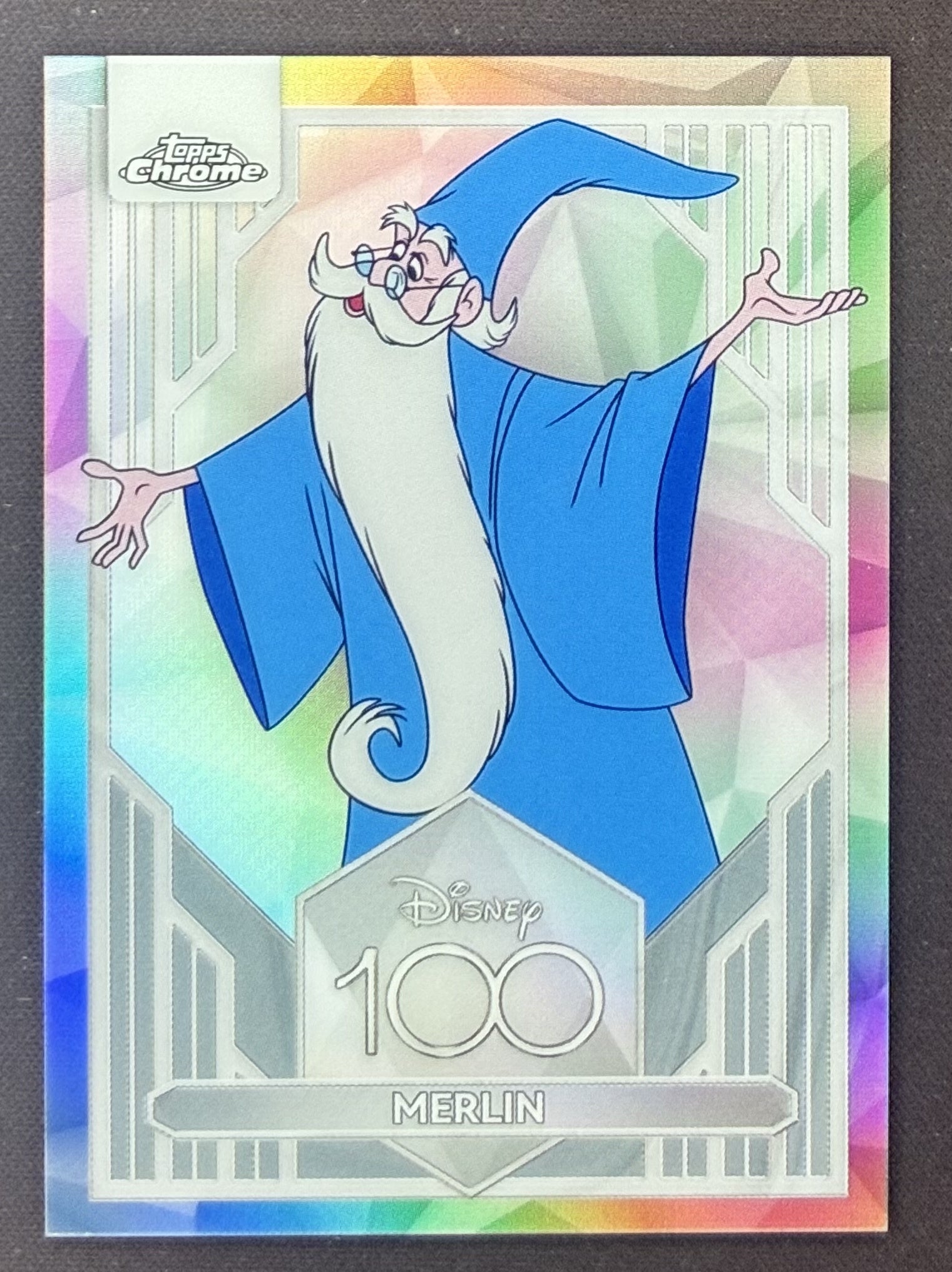 2023 Topps Chrome Disney 100 Merlin #38 Refractor trading card.