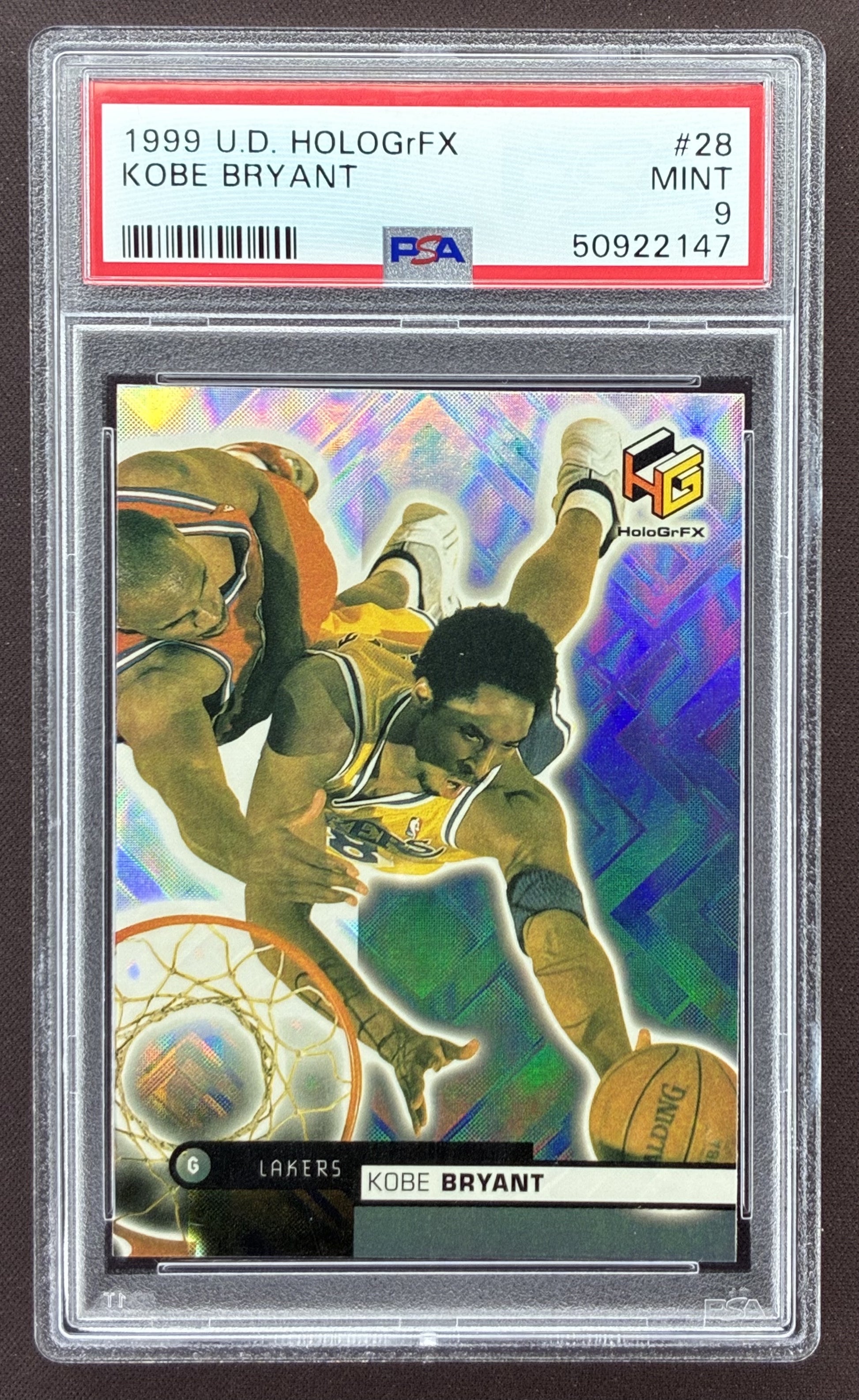 1999-00 Upper Deck HoloGrFX Kobe Bryant #28 Los Angeles Lakers basketball card graded PSA 9 Mint.