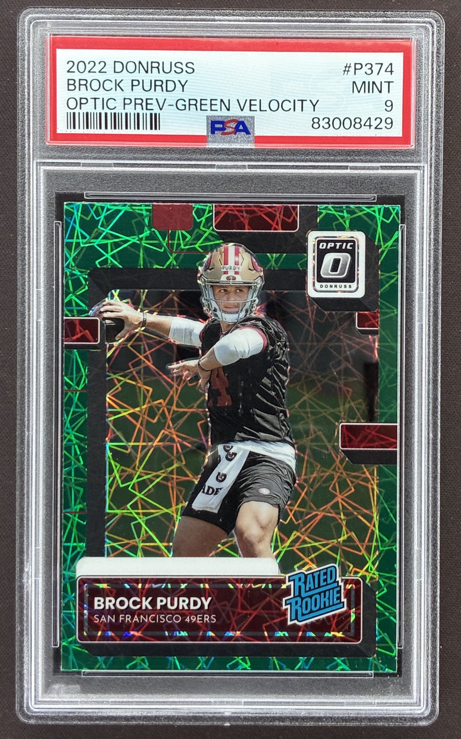 2022 Panini Donruss Brock Purdy Rated Rookie Optic Preview Green Velocity #P-374 graded PSA 9 Mint.