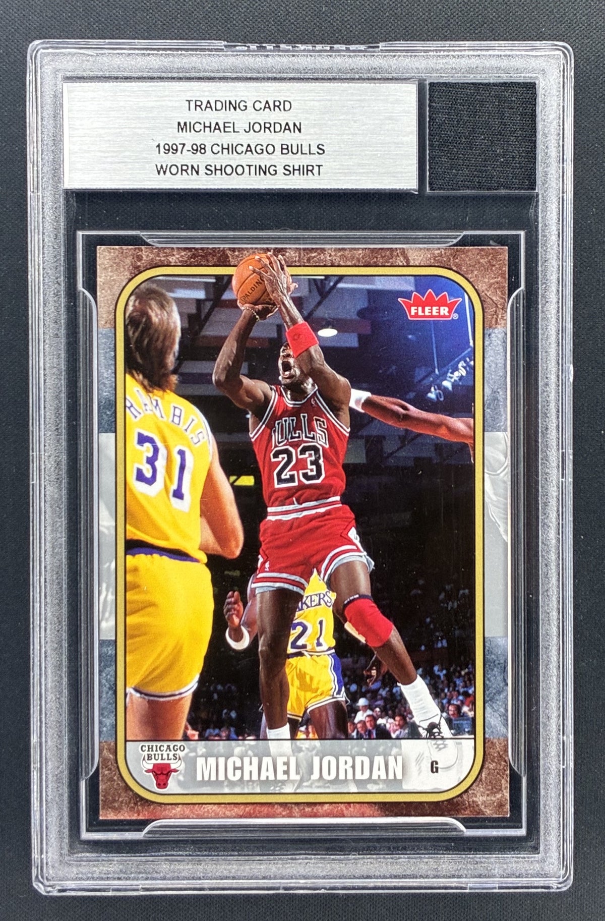 2007-08 Fleer Michael Jordan Chicago Bulls card with Beckett-certified 1997-98 worn shooting shirt memorabilia.