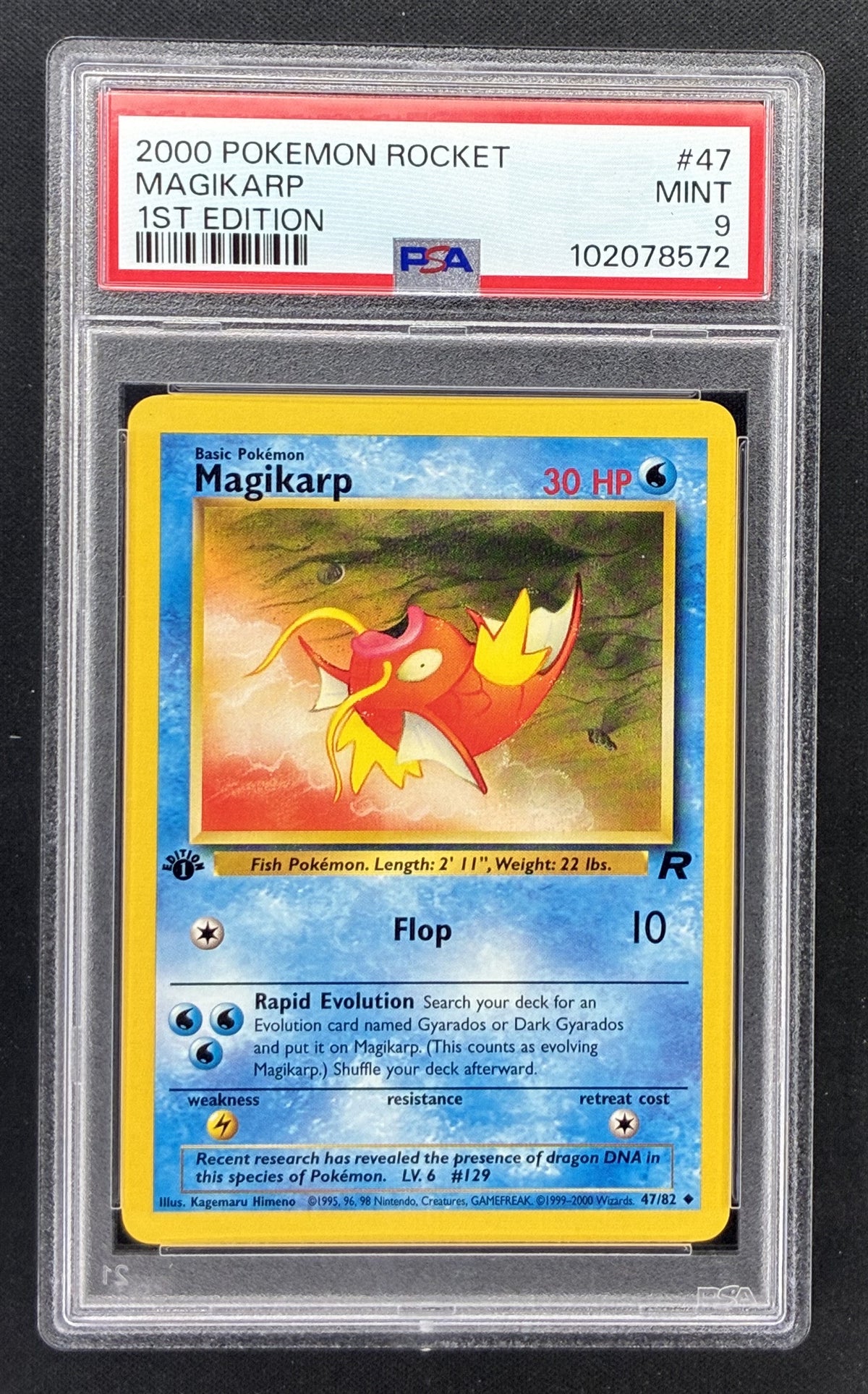 2000 Pokémon Team Rocket Magikarp 47/82 1st Edition English WOTC card graded PSA 9 MINT.