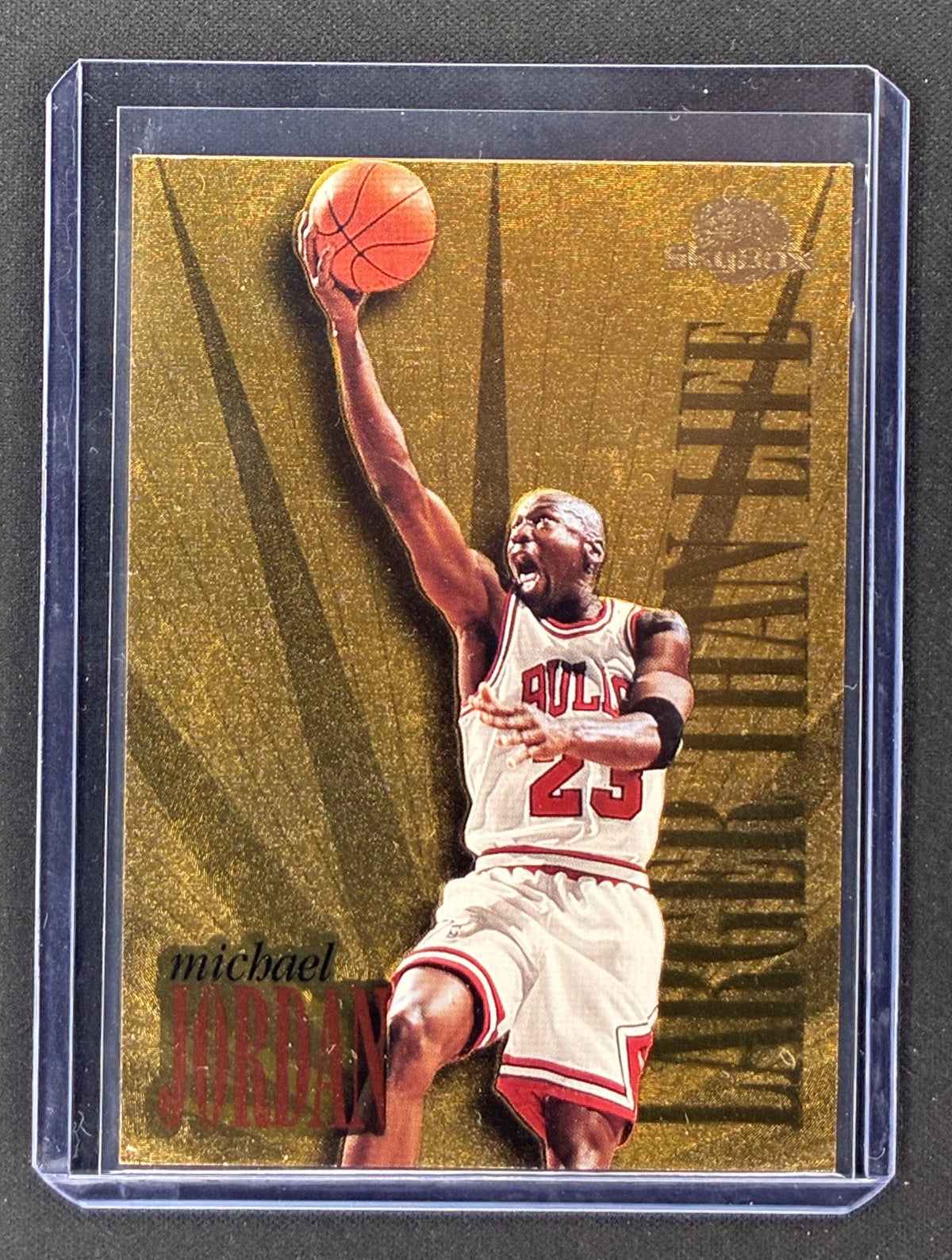 1995-96 SkyBox Premium Michael Jordan Larger Than Life #L1 etched gold foil Chicago Bulls basketball insert card.