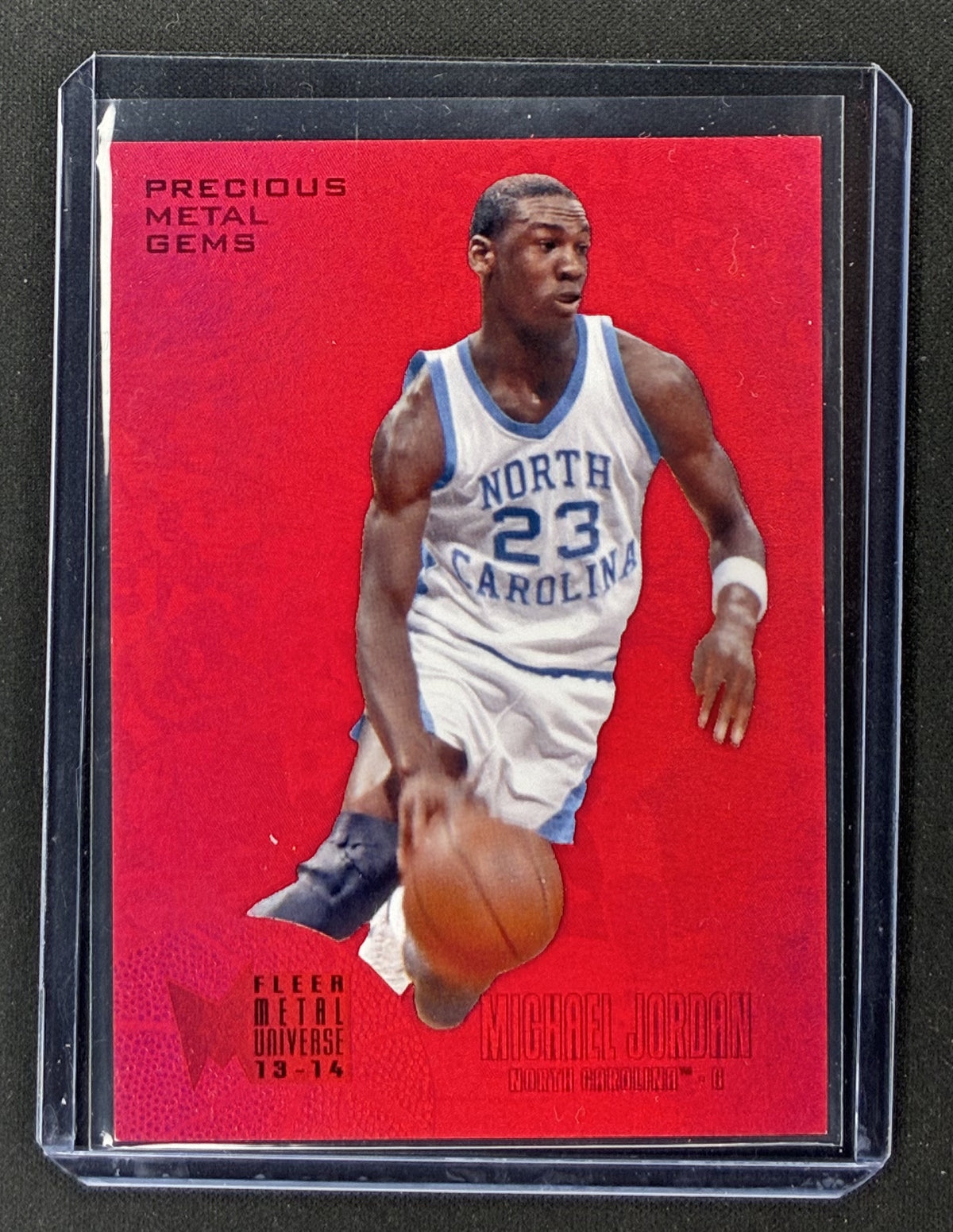 2013-14 Fleer Retro Michael Jordan Metal Universe Precious Metal Gems Red PMG #240 serial numbered to 150.