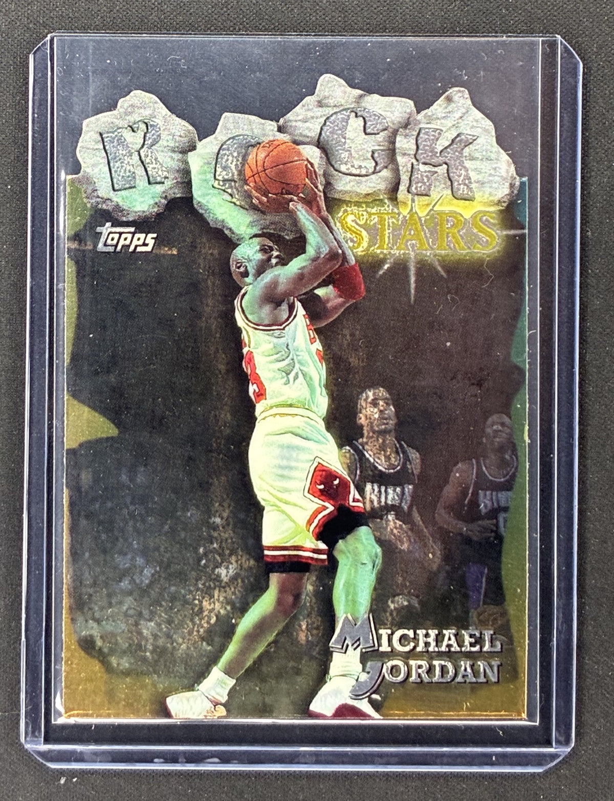 1997-98 Topps Michael Jordan Rock Stars #RS1 Chicago Bulls die-cut insert. Tough 20-card Series One insert falling just 1:36 packs.