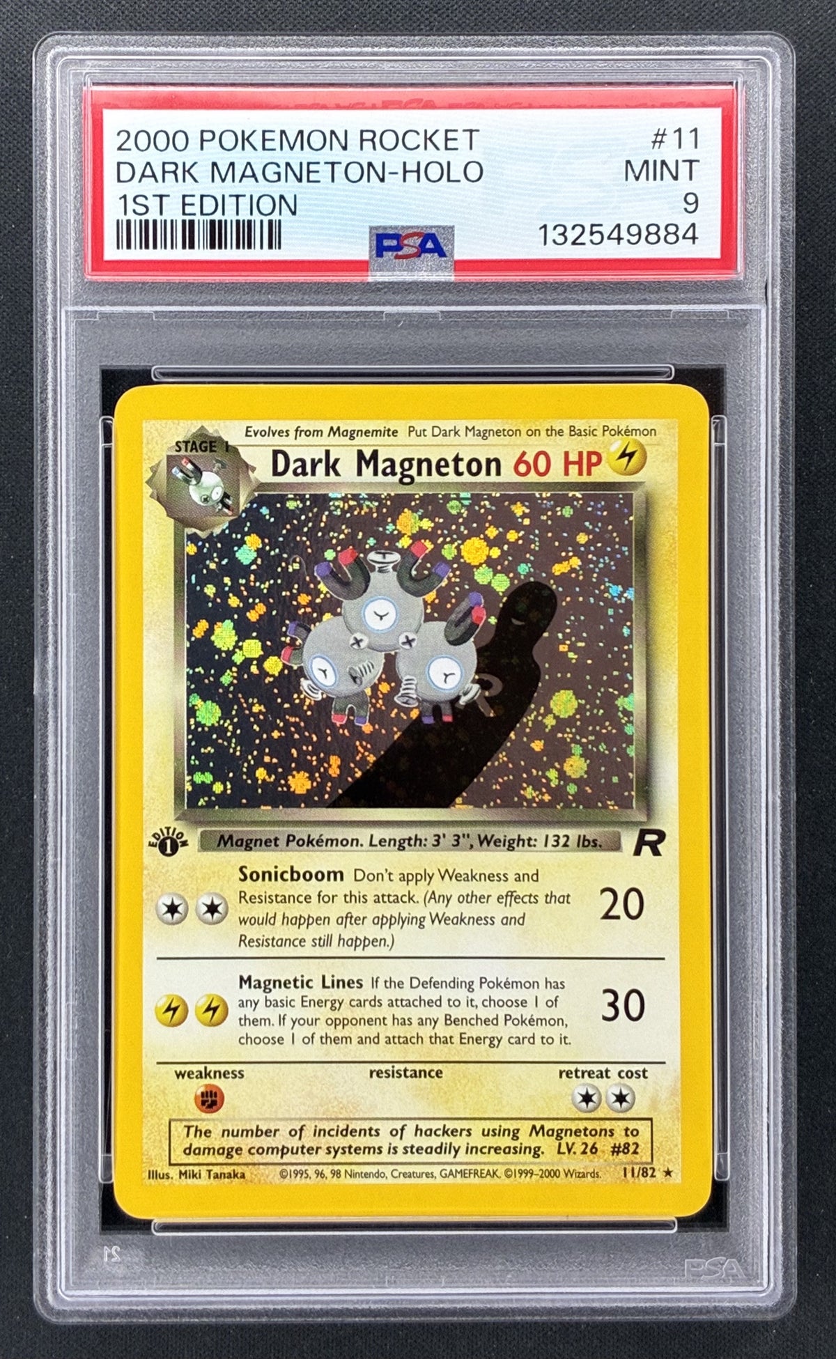 2000 Pokémon Team Rocket Dark Magneton Holo #11/82 1st Edition PSA 9 Mint trading card.