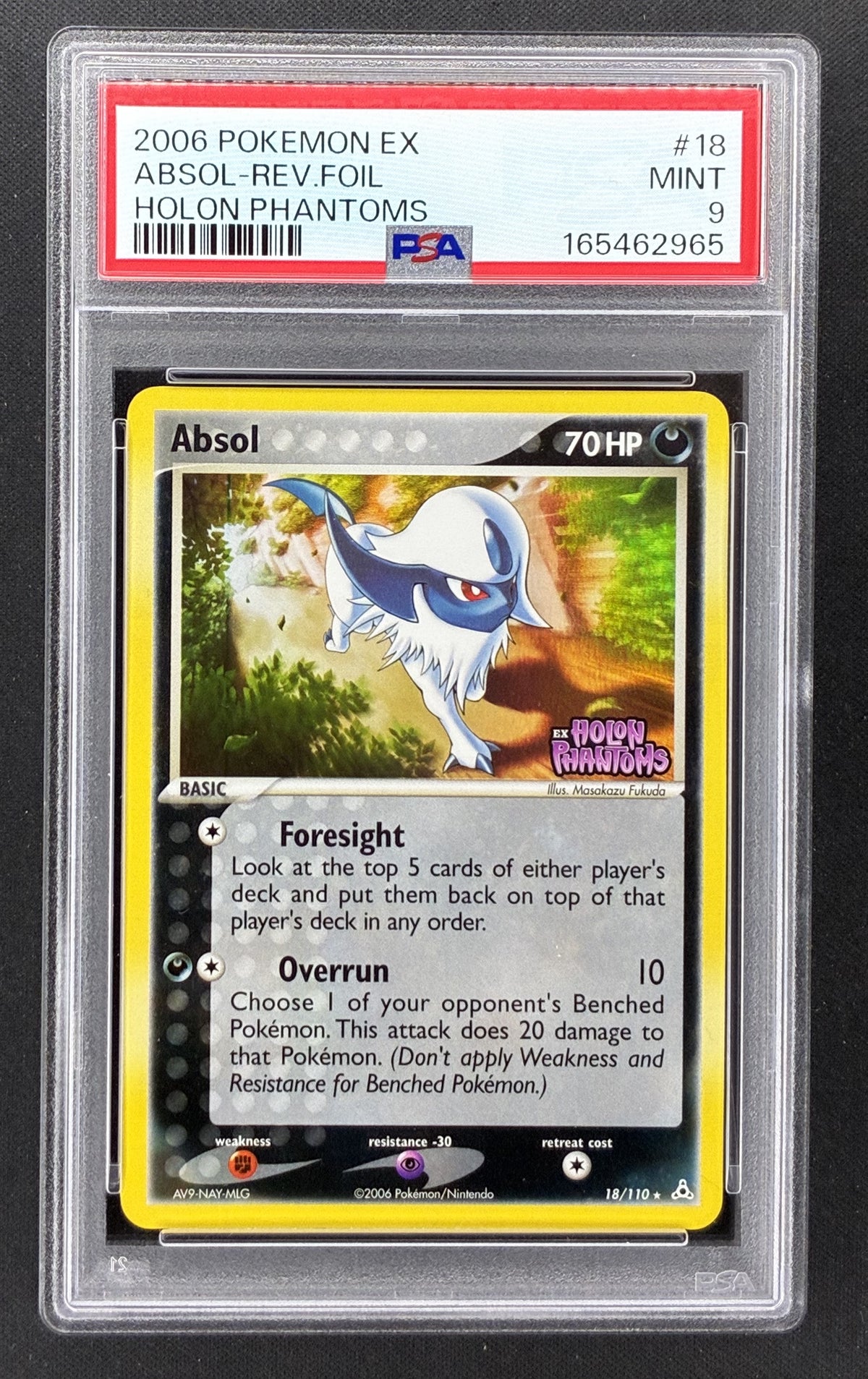 2006 Pokémon EX Holon Phantoms Absol #18/110 stamped Reverse Holo PSA 9 Mint English trading card.